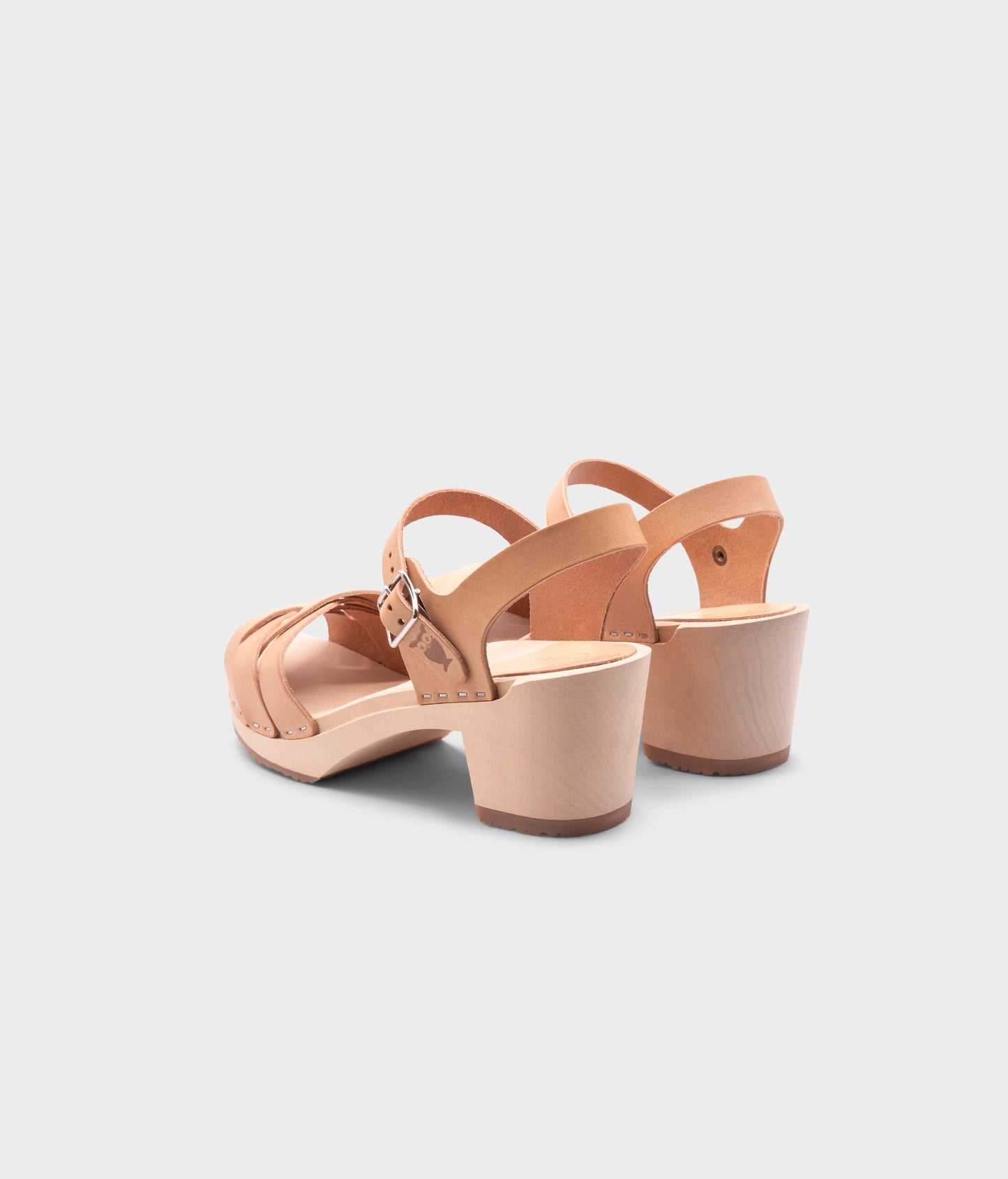 high heeled clog sandals in ecru beige vegetable tanned leather with an open-toe stapled on a light wooden base