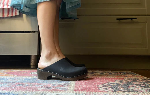 Discover Emma's Sustainable Style Journey with Our Timeless Wooden Clogs