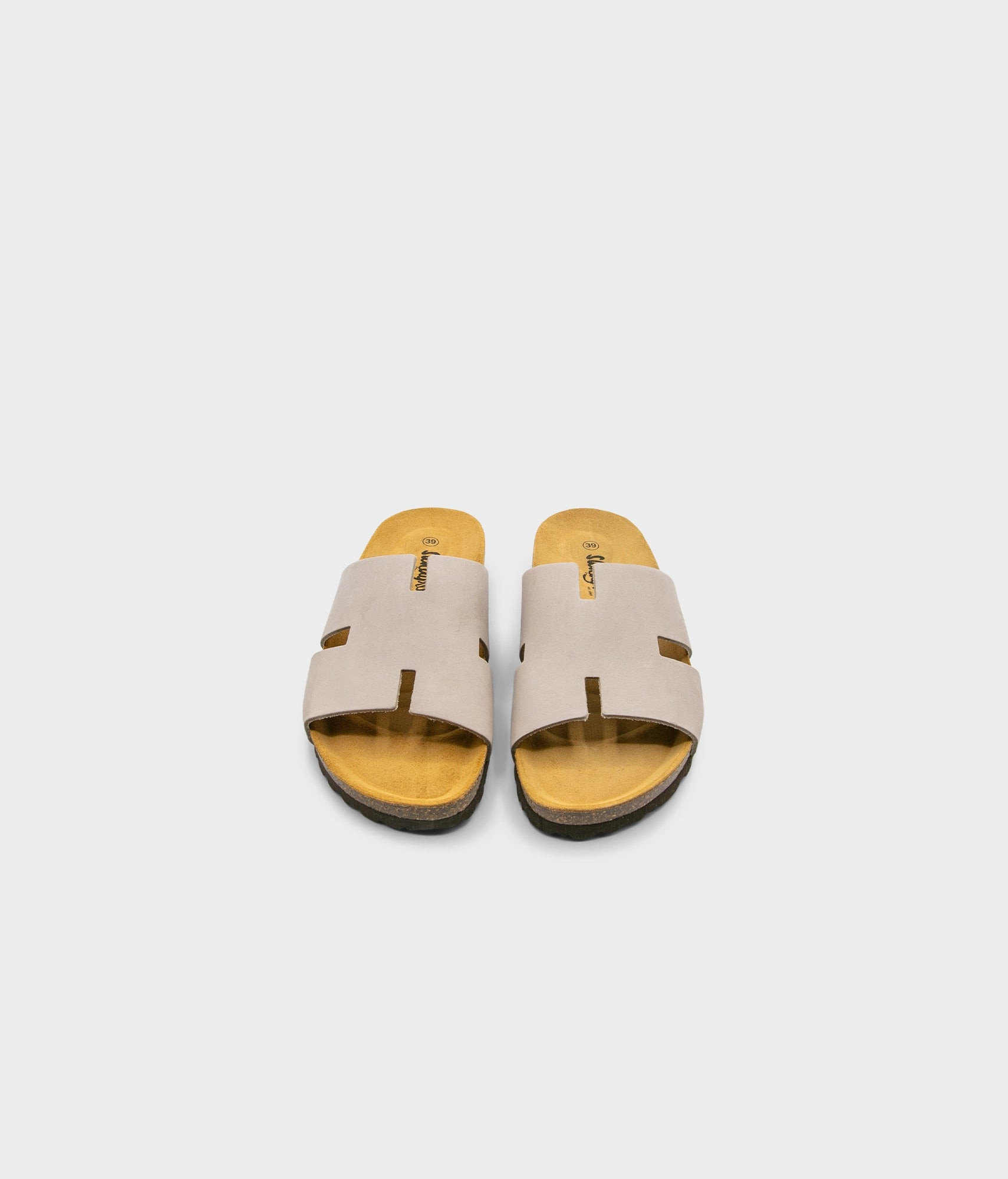 cork sandal with an H-shaped cutout in sandstone beige nubuck leather, suede footbed and black EVA outersole