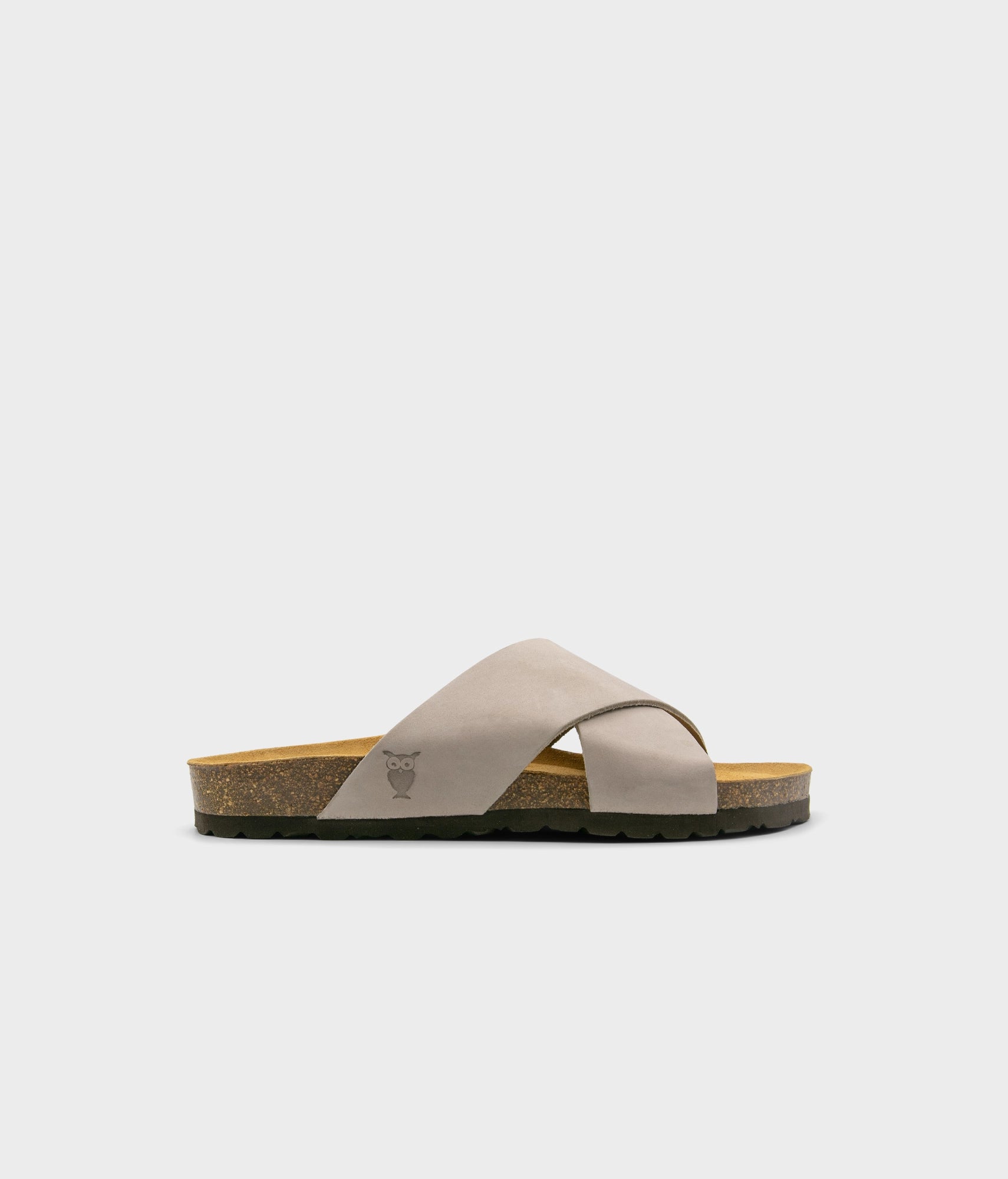 criss cross cork sandal in sandstone beige oiled full-grain nubuck leather with a brown EVA outersole and suede footbed