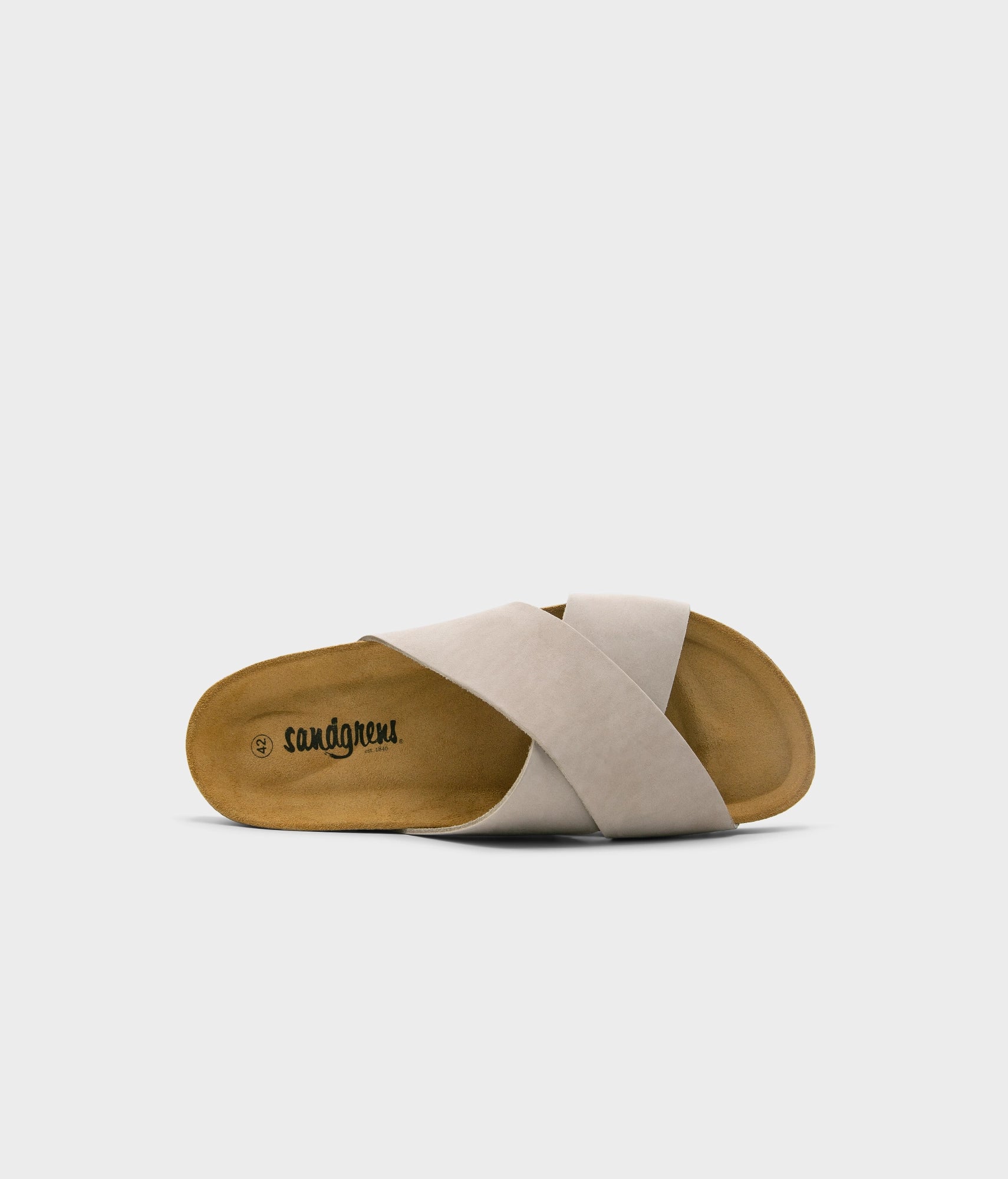 criss cross cork sandal in sandstone beige oiled full-grain nubuck leather with a brown EVA outersole and suede footbed