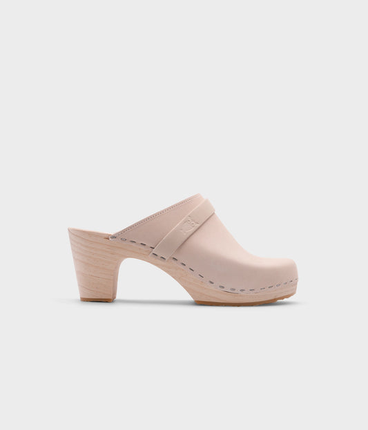 classic high rise heel clog mule in sand white nubuck leather stapled on a light wooden base