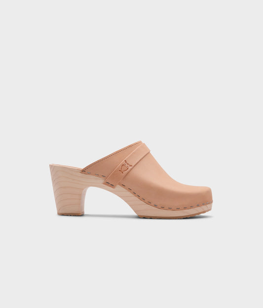 high rise classic clog mule in ecru beige vegetable tanned leather stapled on a light wooden base
