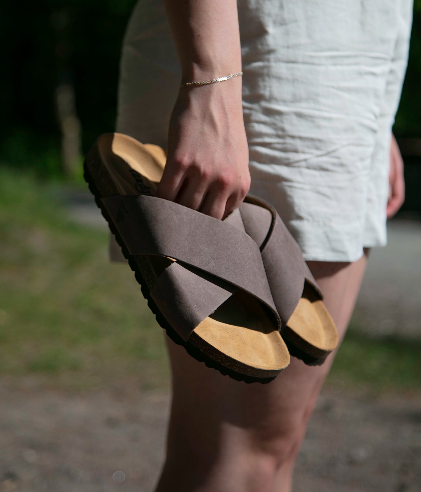 criss cross cork sandal in walnut brown oiled full-grain nubuck leather with a brown EVA outersole and suede footbed