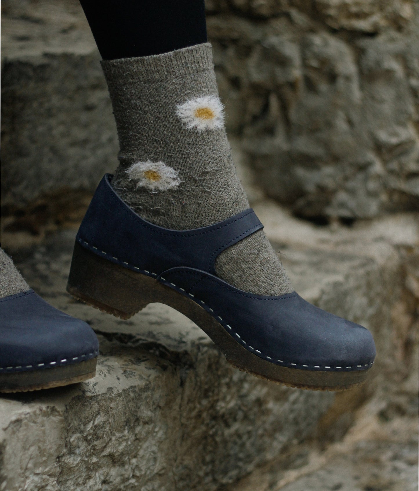 Mary Jane wooden clogs in navy blue nubuck leather stapled on a dark wooden base