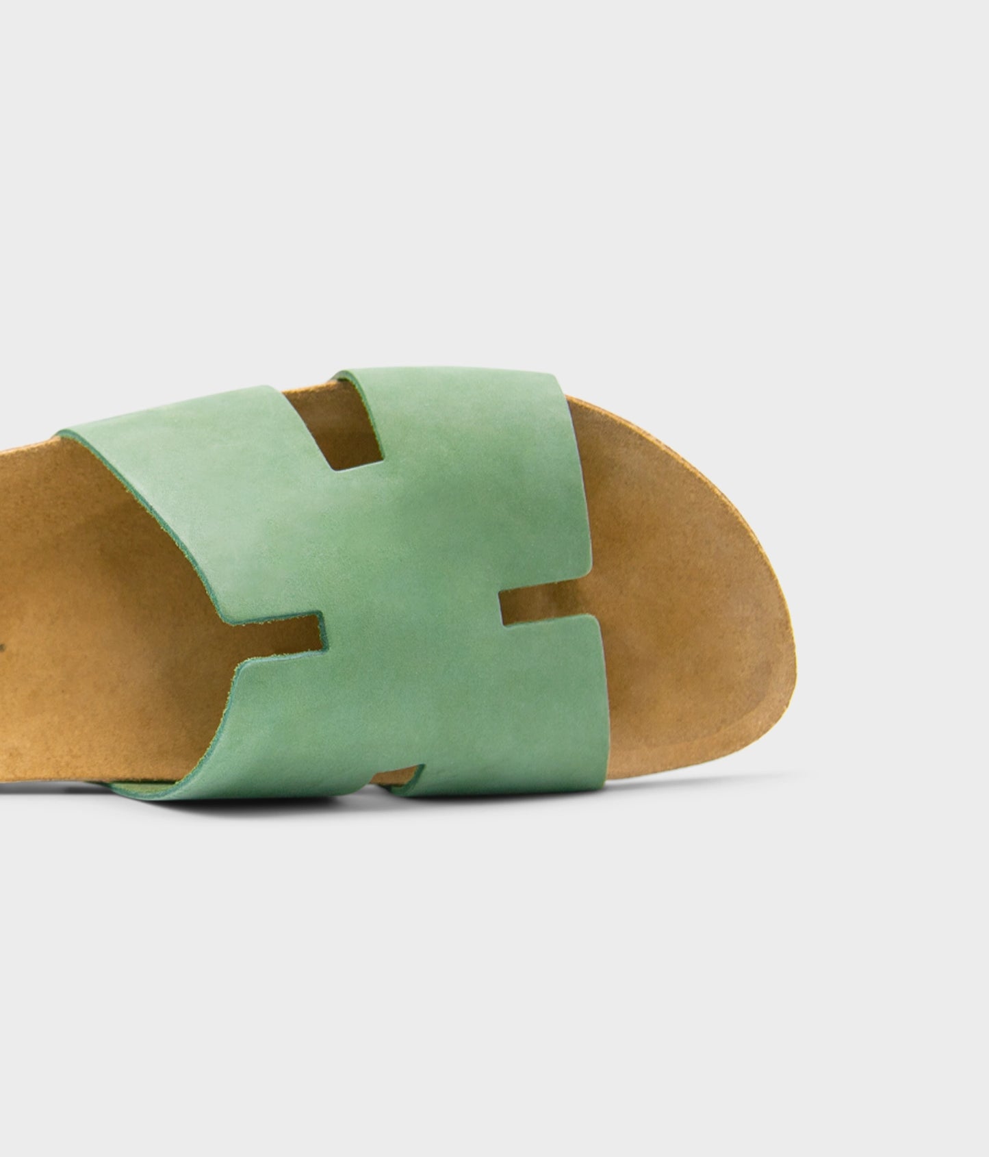 cork sandal with an H-shaped cutout in Jade Green nubuck leather, suede footbed and brown EVA outersole