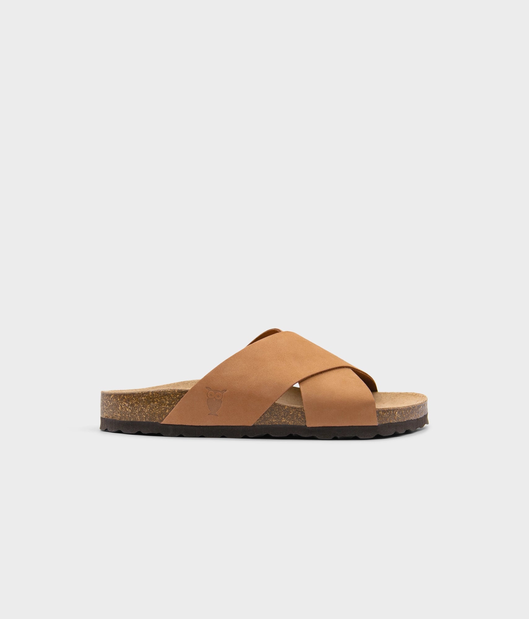 criss cross cork sandal in light terracotta oiled full-grain nubuck leather with a brown EVA outersole and suede footbed