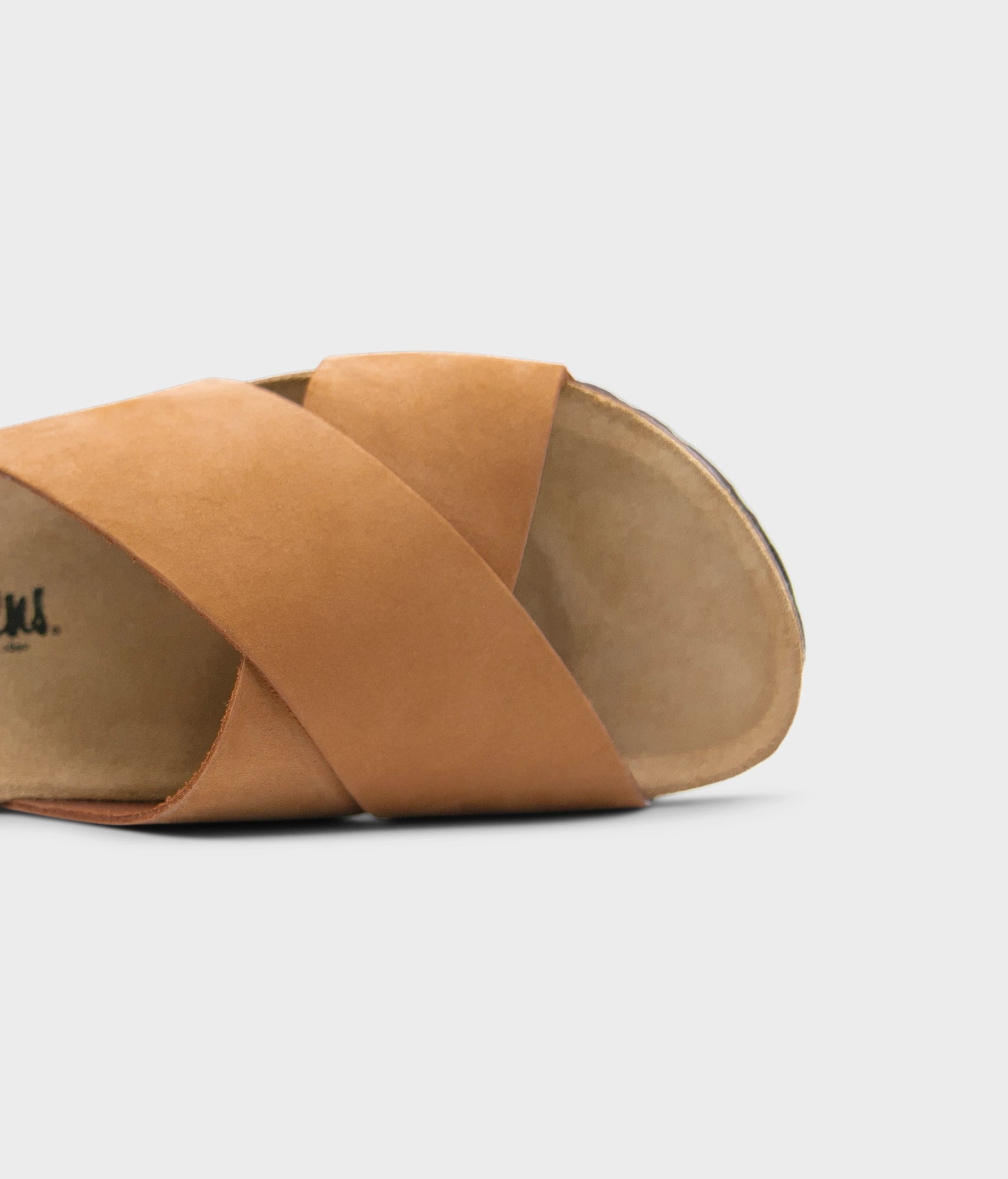 criss cross cork sandal in light terracotta oiled full-grain nubuck leather with a brown EVA outersole and suede footbed