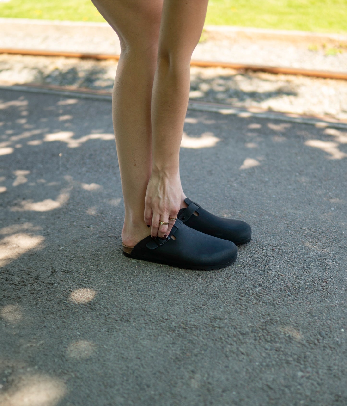 closed-toe cork sandal in black nubuck leather with a strap with a black buckle, suede footbed and black EVA outersole