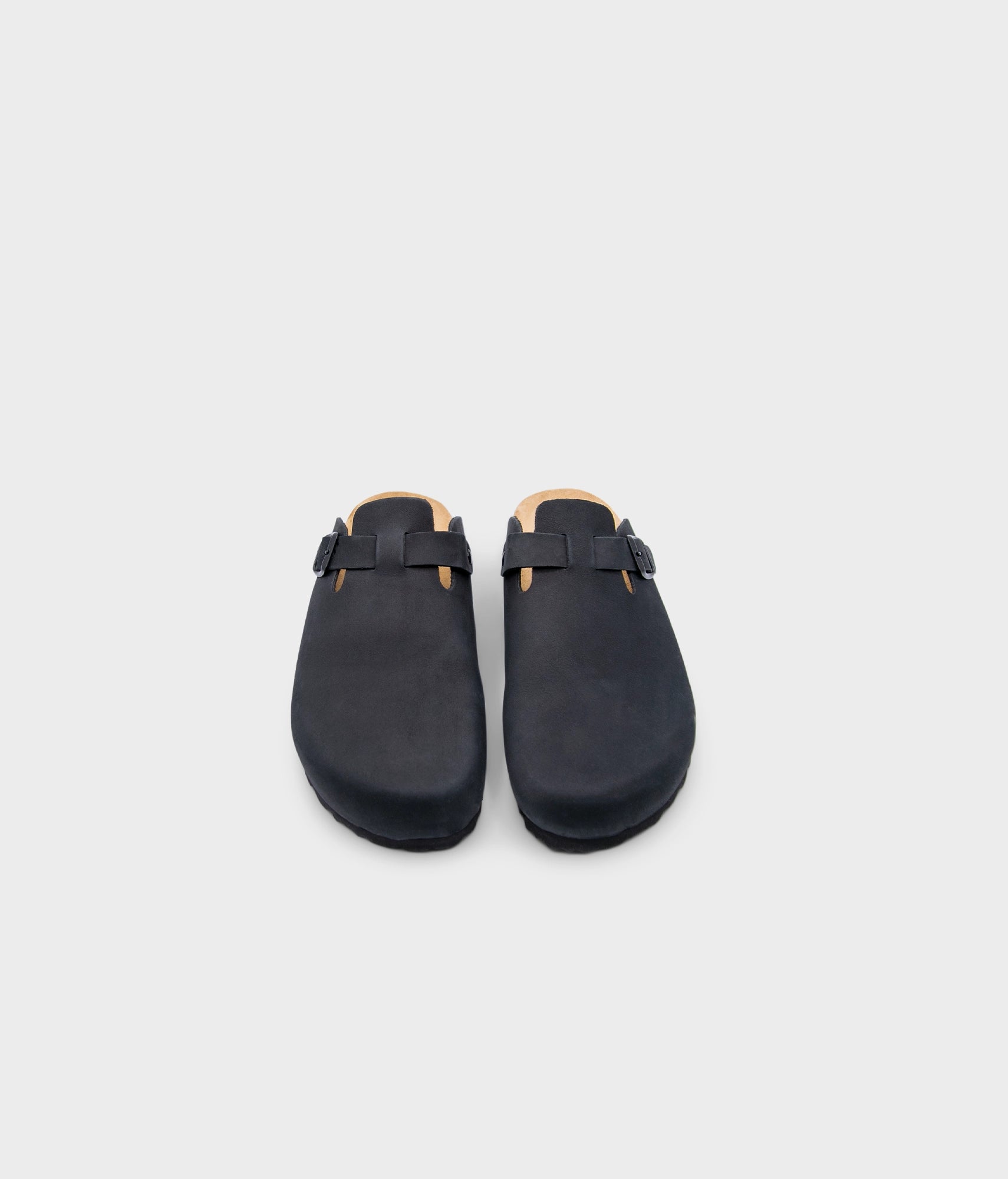 closed-toe cork sandal in black nubuck leather with a strap with a black buckle, suede footbed and black EVA outersole