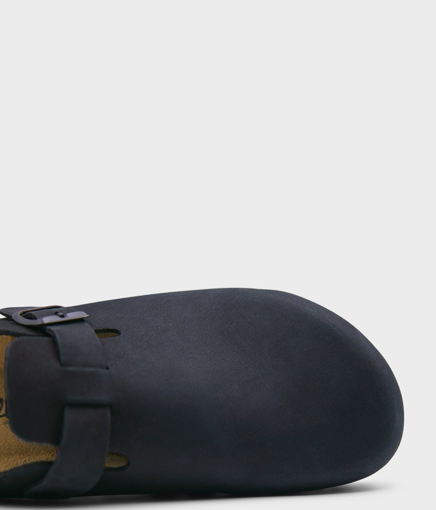 closed-toe cork sandal in black nubuck leather with a strap with a black buckle, suede footbed and black EVA outersole