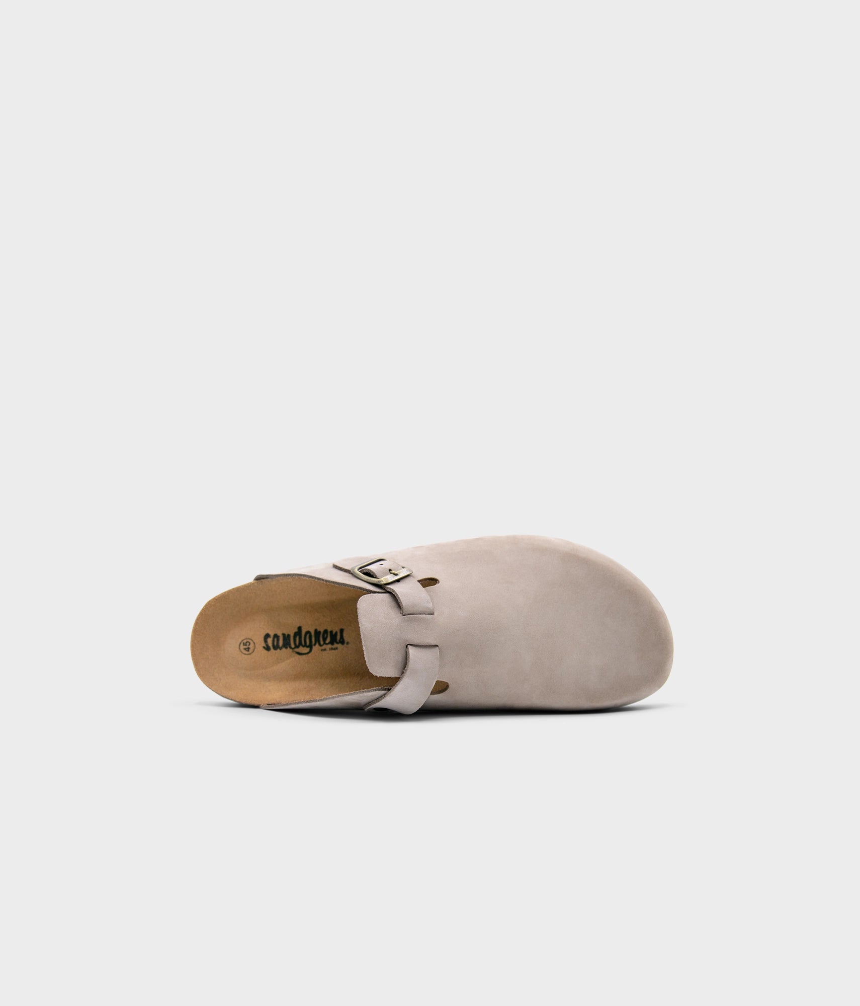 closed-toe cork sandal in standstone beige nubuck leather with a strap with a brass gold buckle, suede footbed and brown EVA outersole