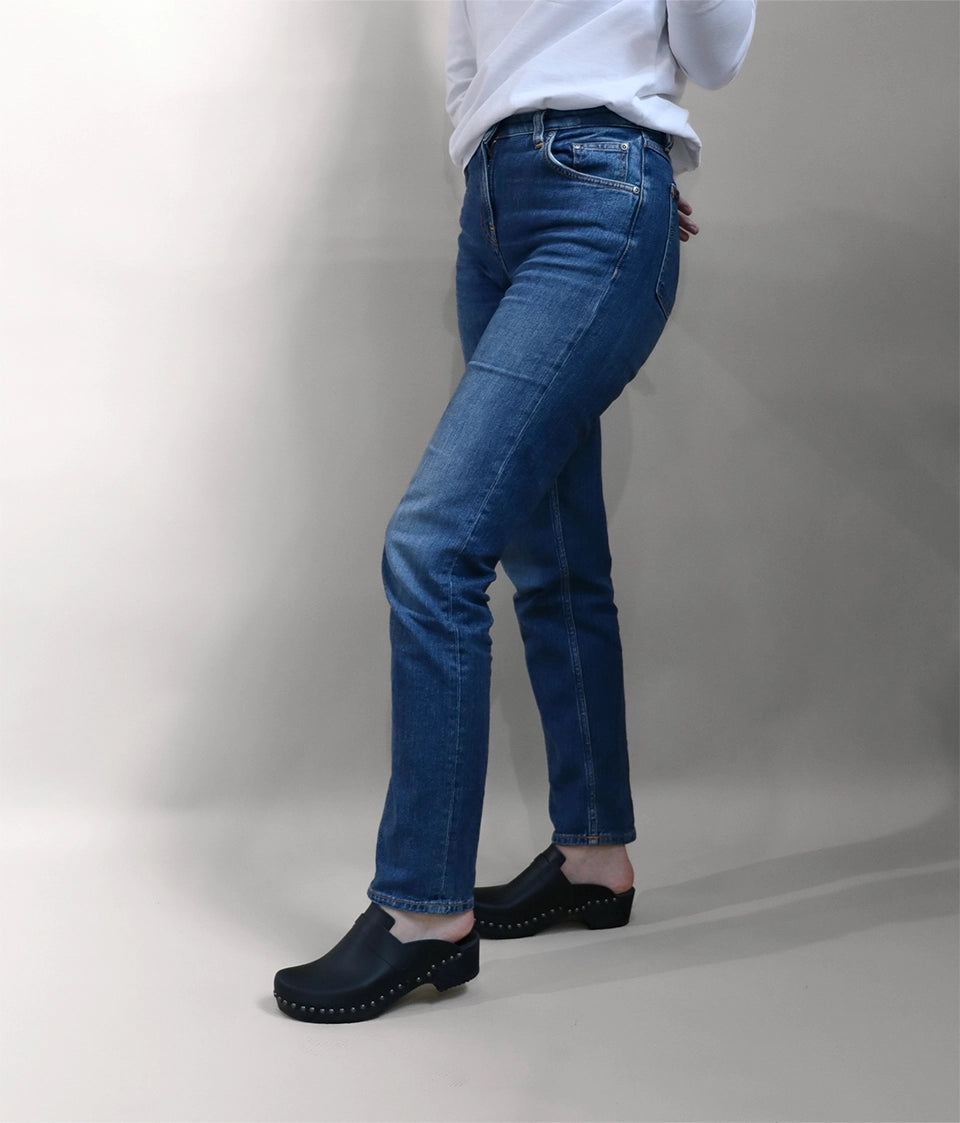 Woman wearing wooden clogs 