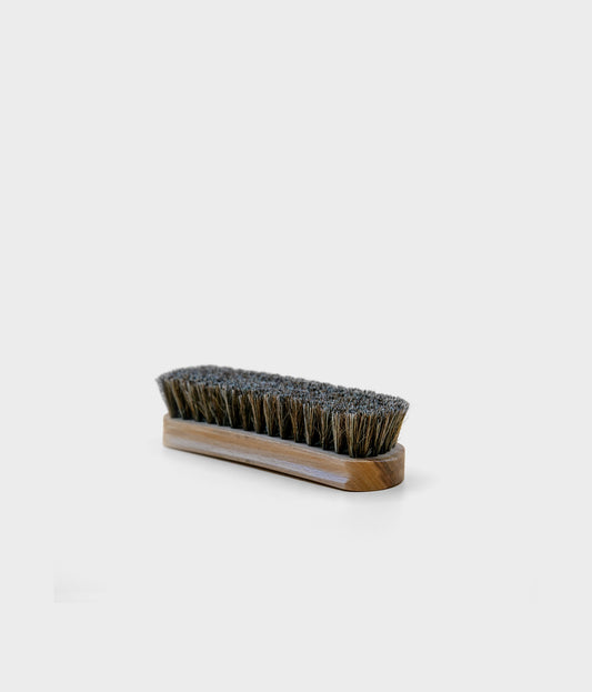 a shoe brush made out of horse hair