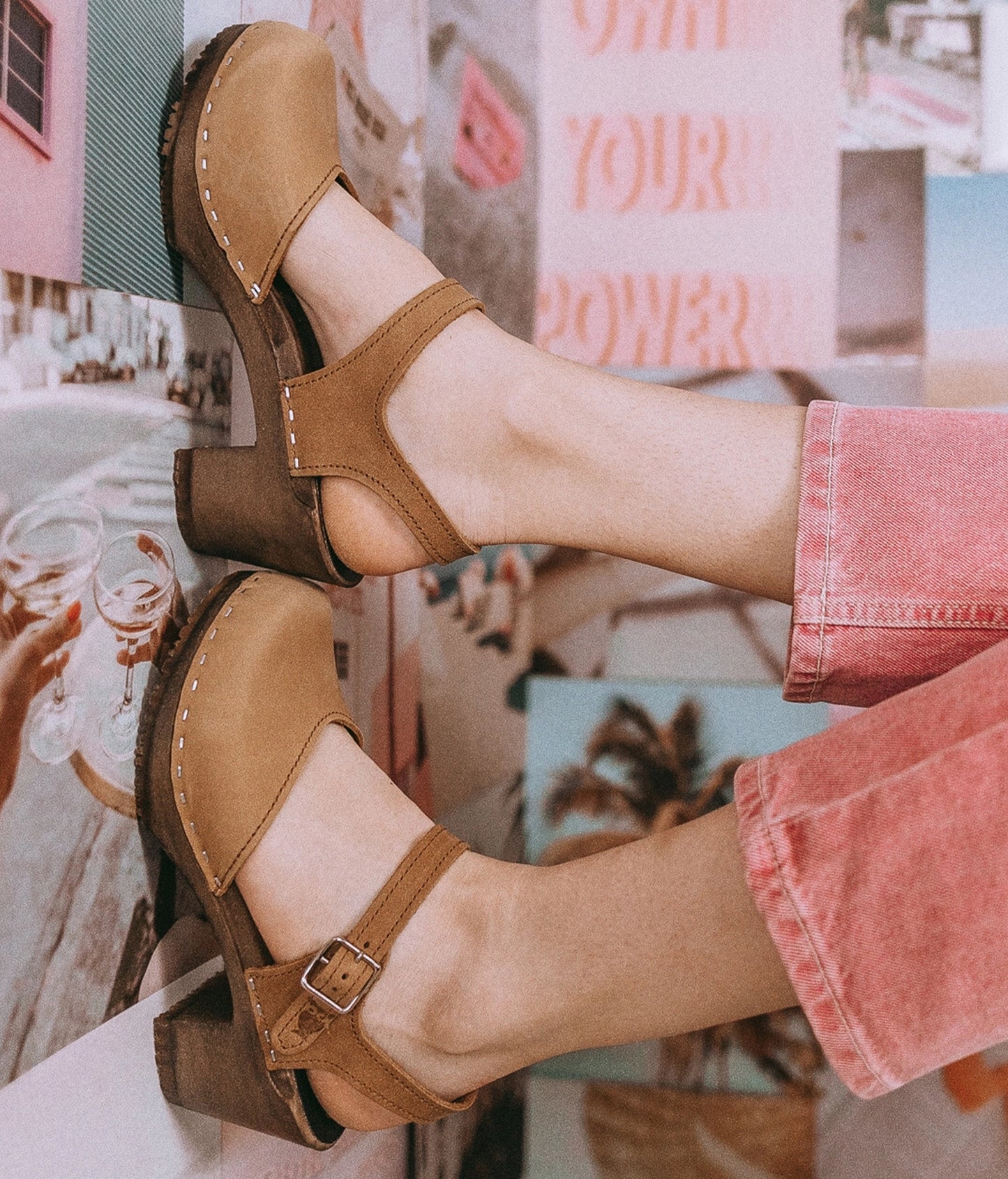 high heeled closed-toe clog sandal in light brown nubuck leather stapled on a dark wooden base