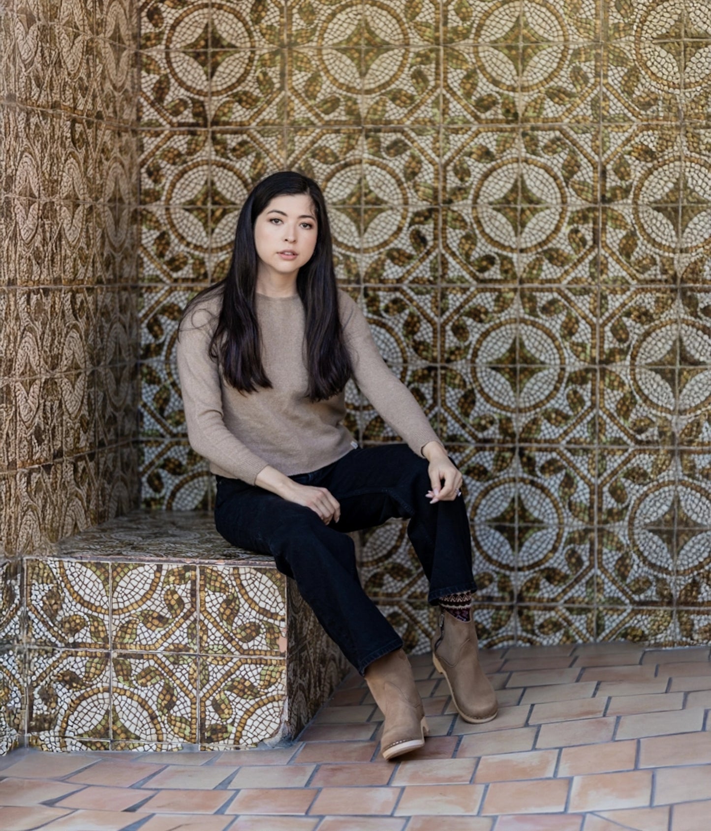 low-heeled clog boots in light brown, dextertan colored nubuck  leather stapled on a light wooden base