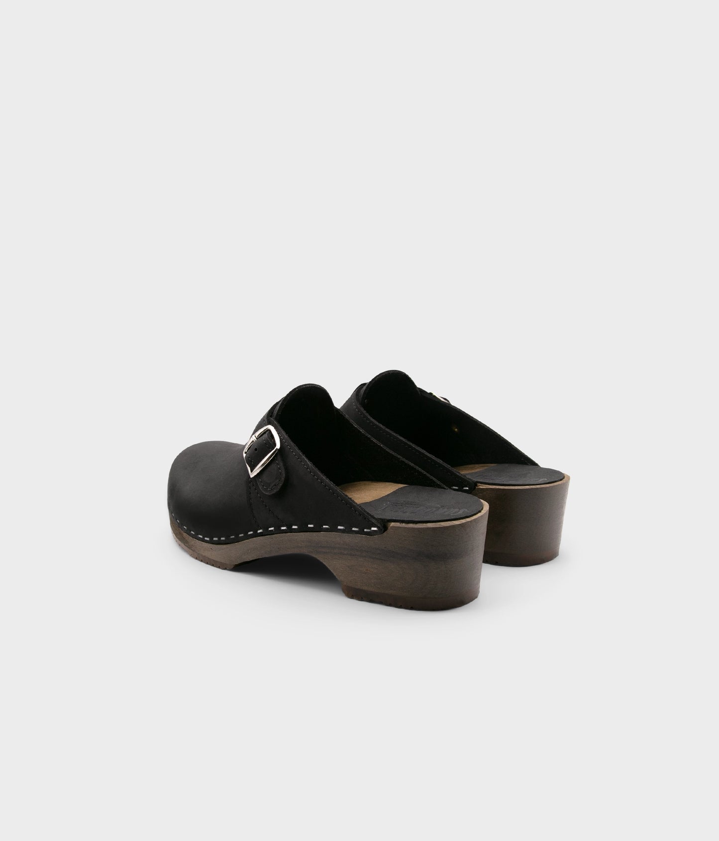 Halmstad buckled clog mules