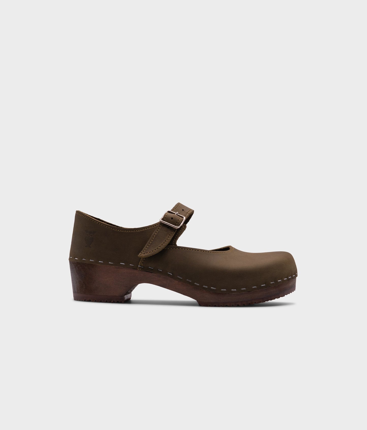 Mary Jane wooden clogs in olive green nubuck leather stapled on a dark wooden base