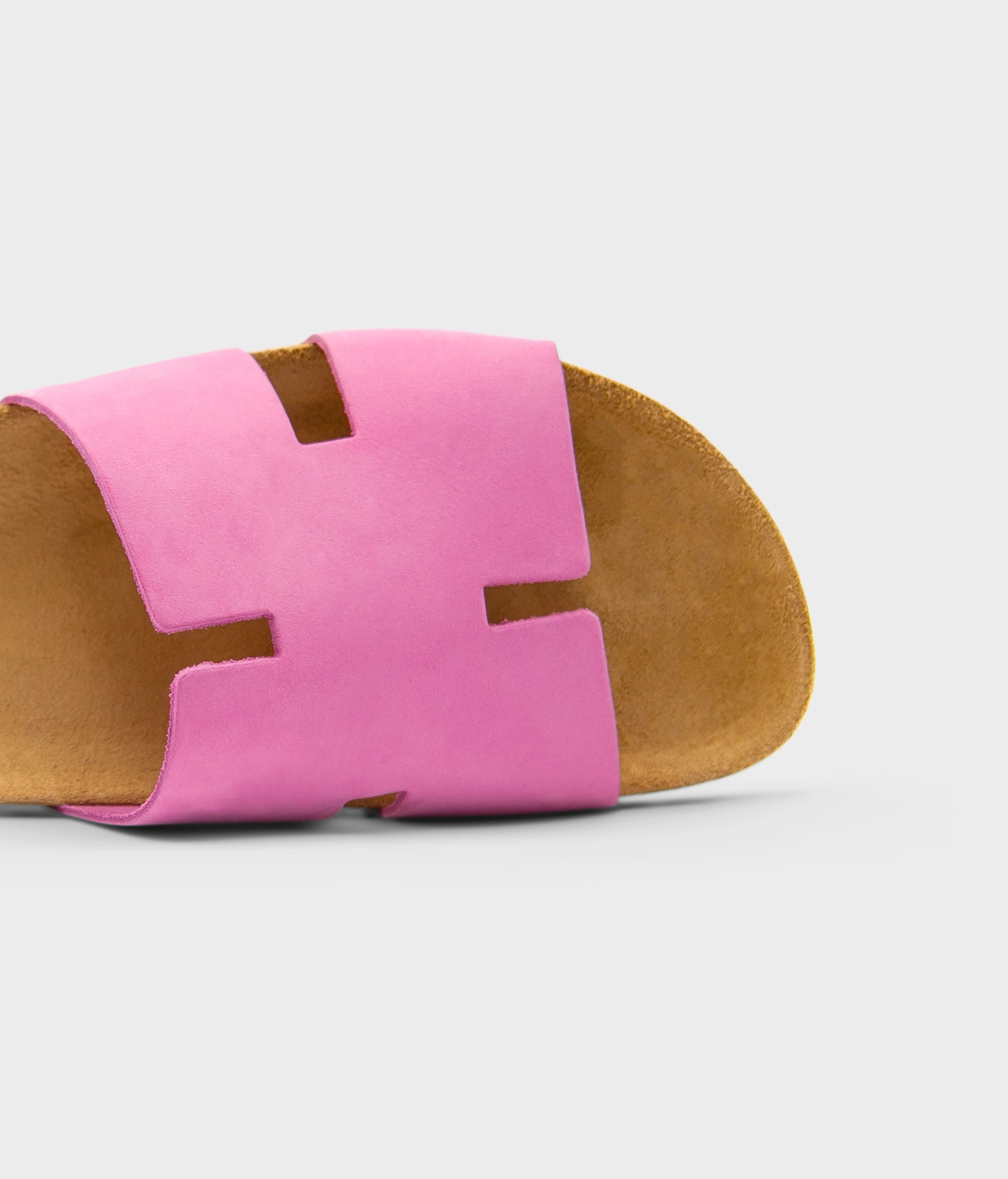 cork sandal with an H-shaped cutout in Magenta pink nubuck leather, suede footbed and brown EVA outersole