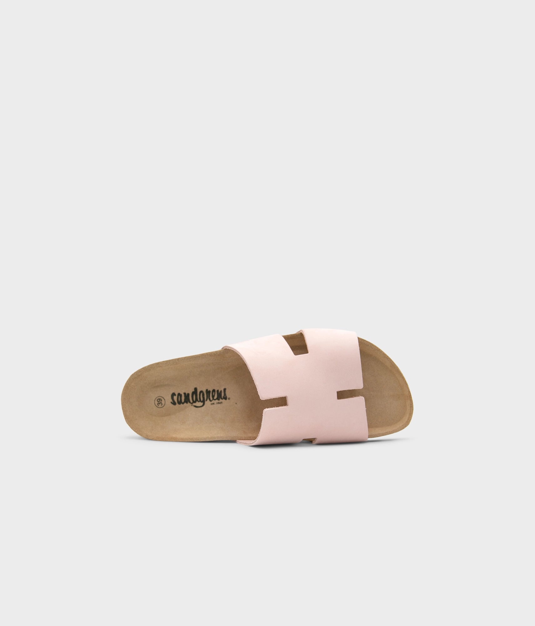 cork sandal with an H-shaped cutout in pale pink nubuck leather, suede footbed and brown EVA outersole