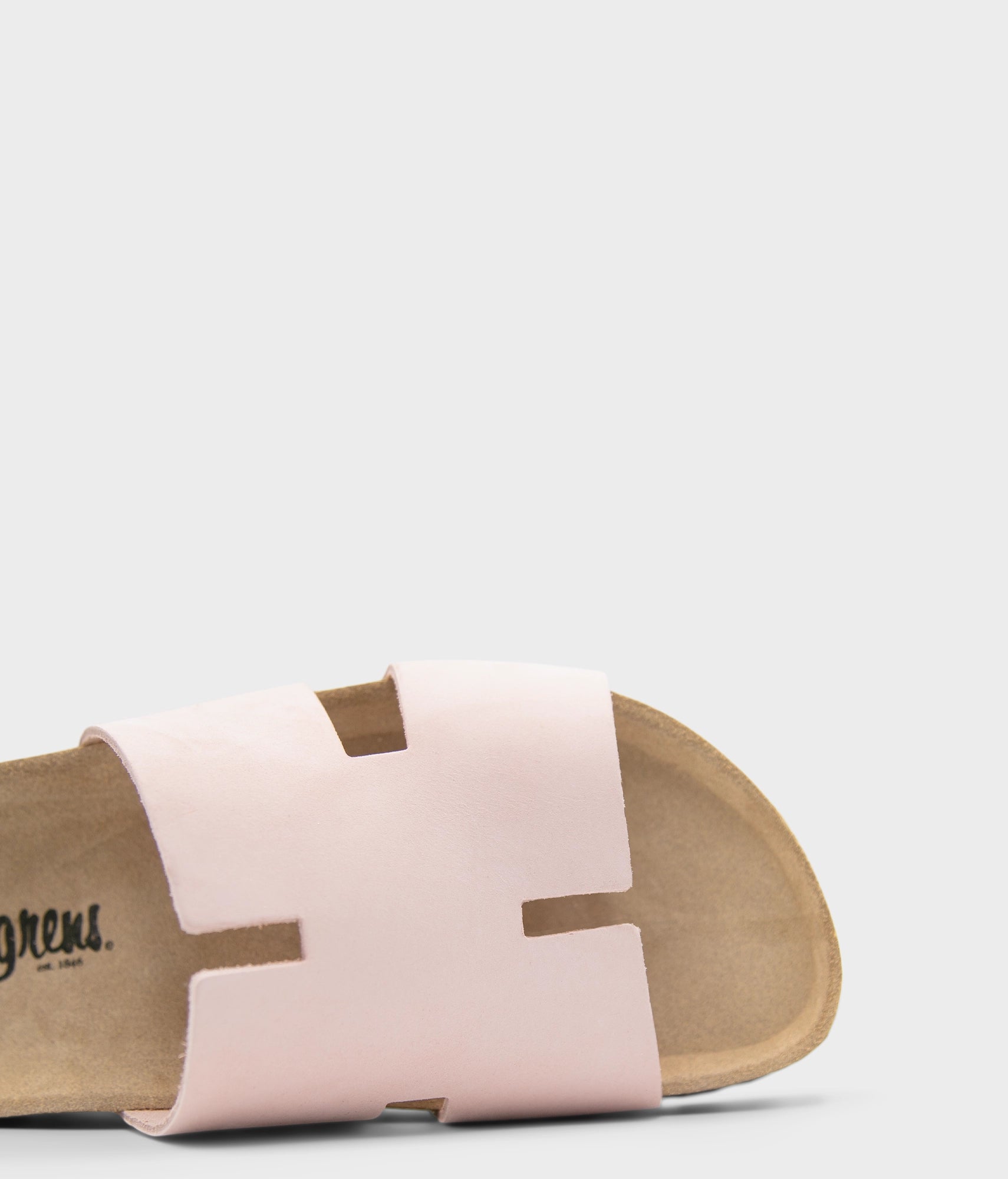 cork sandal with an H-shaped cutout in pale pink nubuck leather, suede footbed and brown EVA outersole