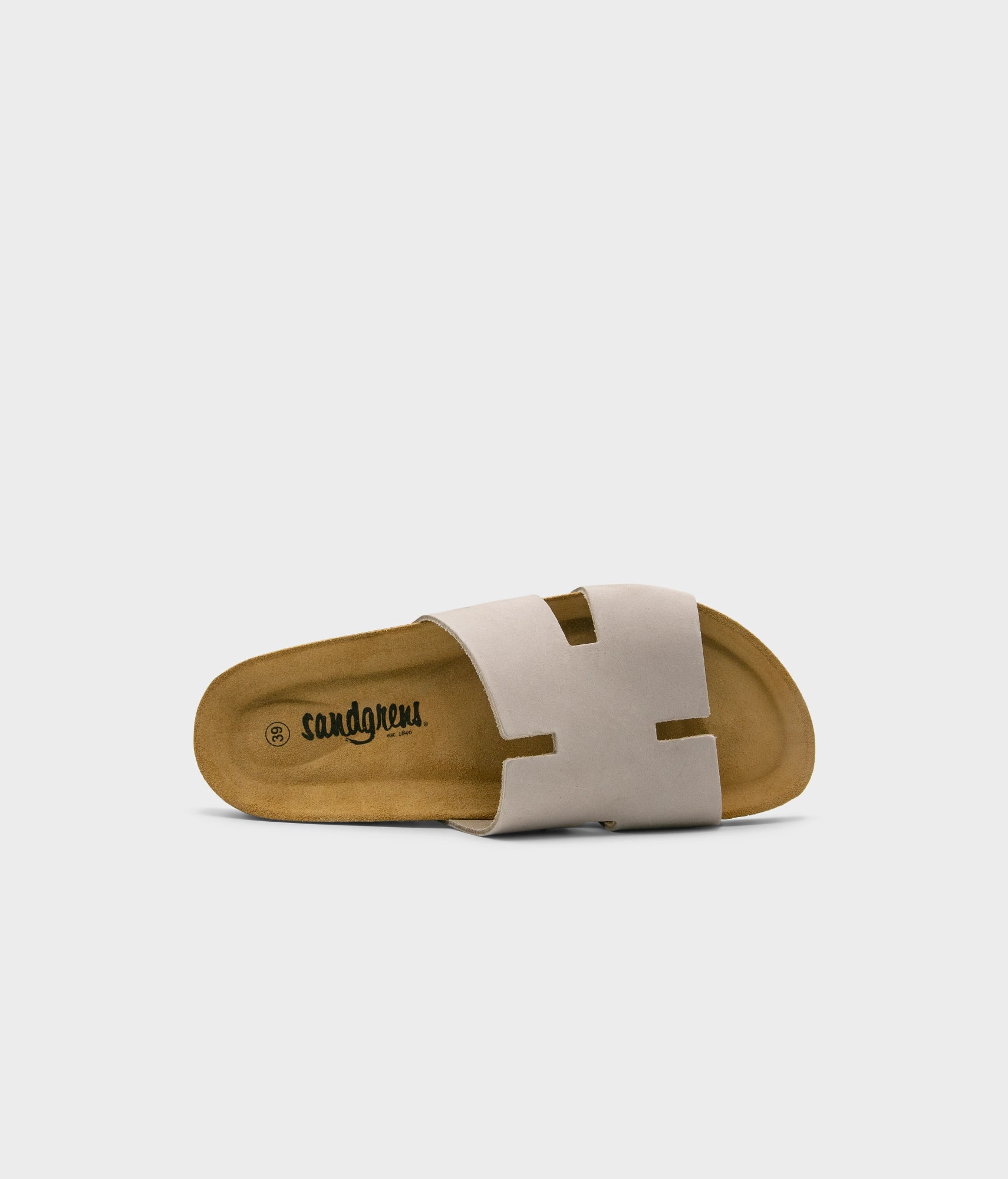 cork sandal with an H-shaped cutout in sandstone beige nubuck leather, suede footbed and black EVA outersole