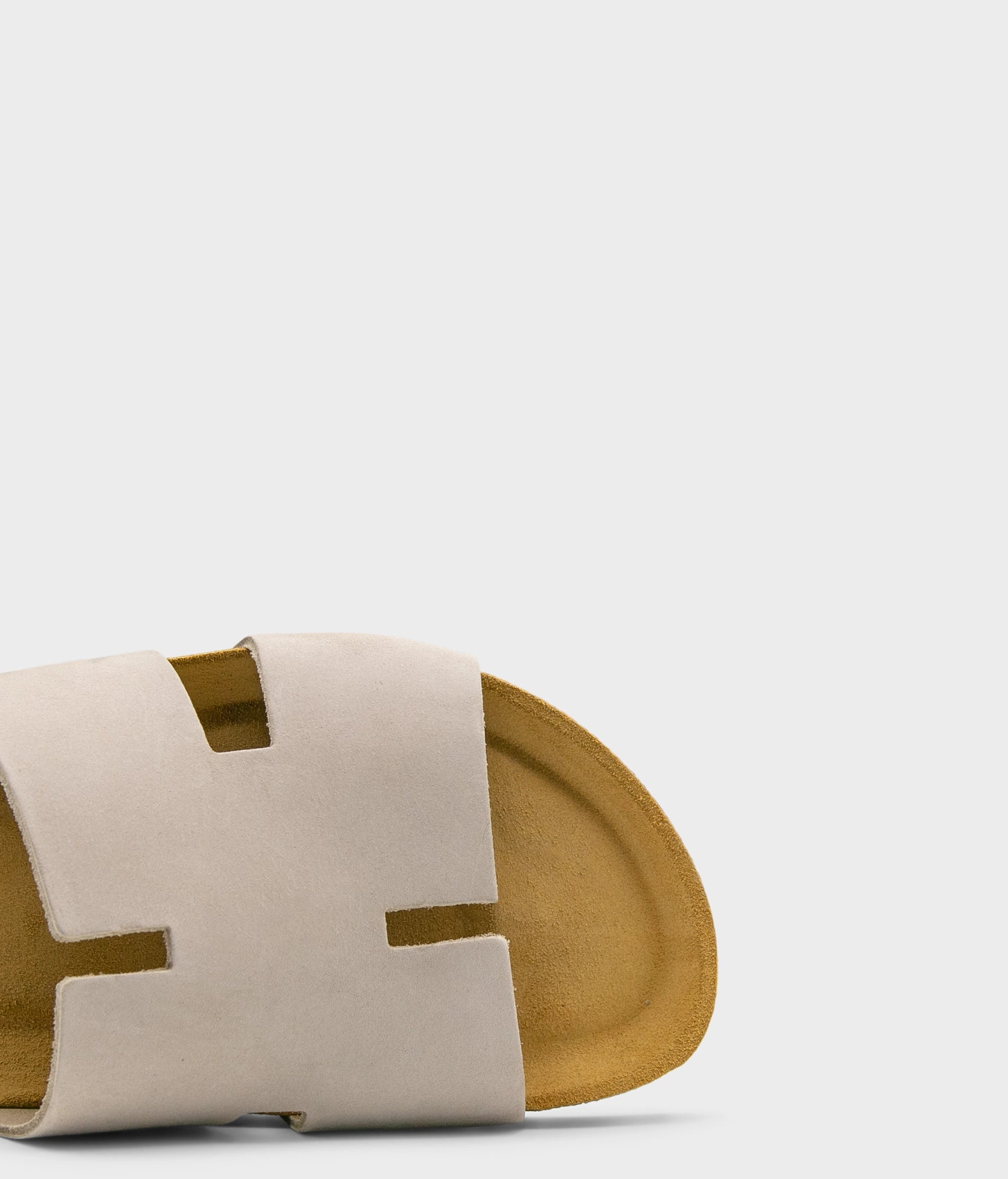 cork sandal with an H-shaped cutout in sandstone beige nubuck leather, suede footbed and black EVA outersole