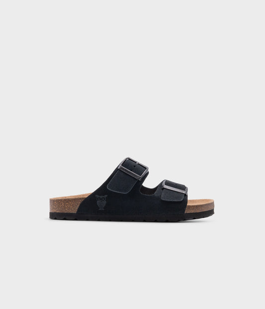 classic cork sandal with two straps in a comfortable black suede leather with a suede footbed 