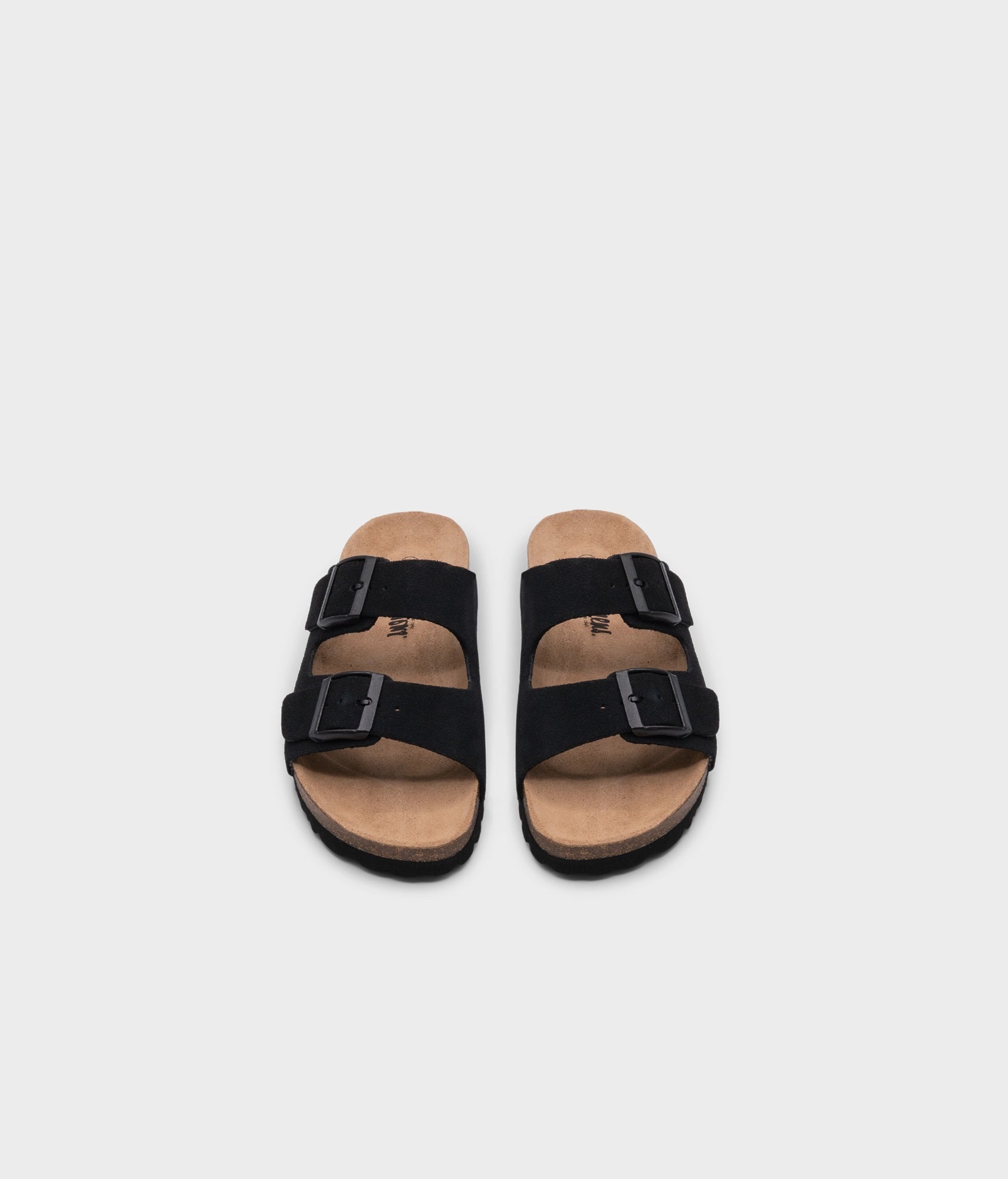 classic cork sandal with two straps in a comfortable black suede leather with a suede footbed 