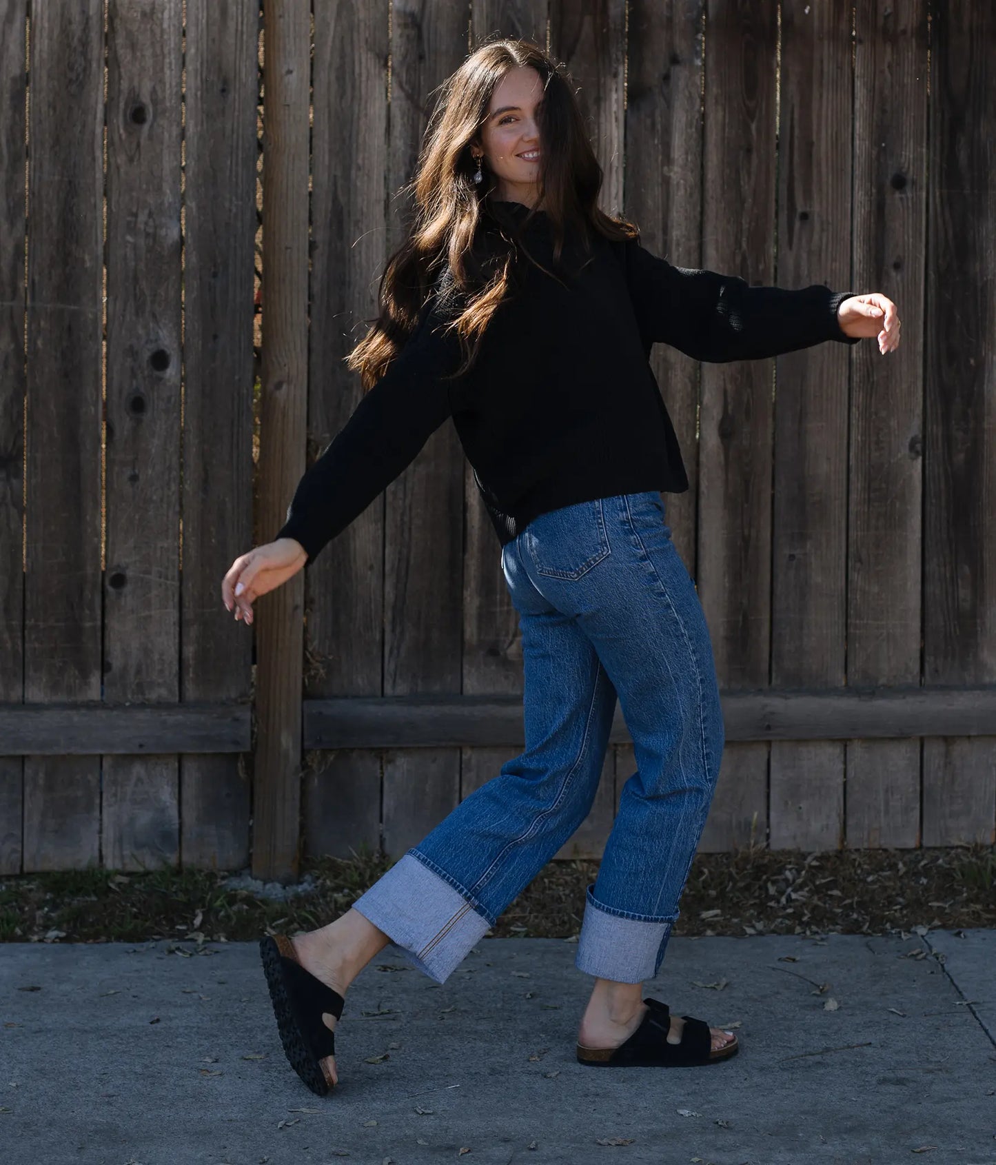 classic cork sandal with two straps in a comfortable black suede leather with a suede footbed 