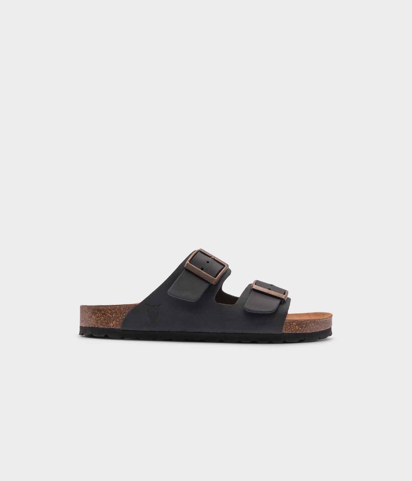 classic cork sandal with two straps in full-grain black nubuck leather with a blue tint, suede footbed and brass gold buckles
