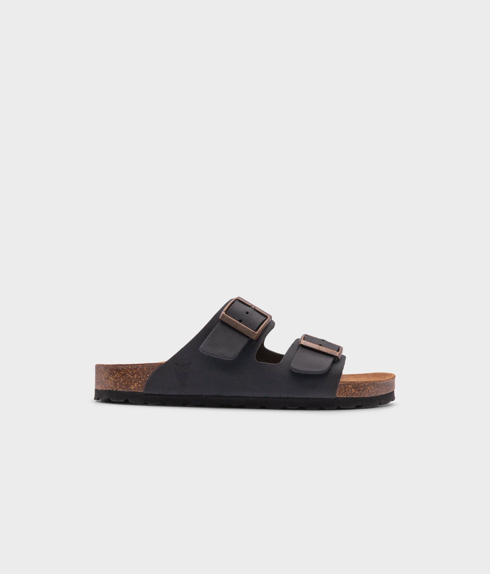 classic cork sandal with two straps in full-grain black nubuck leather with a blue tint, suede footbed and brass gold buckles
