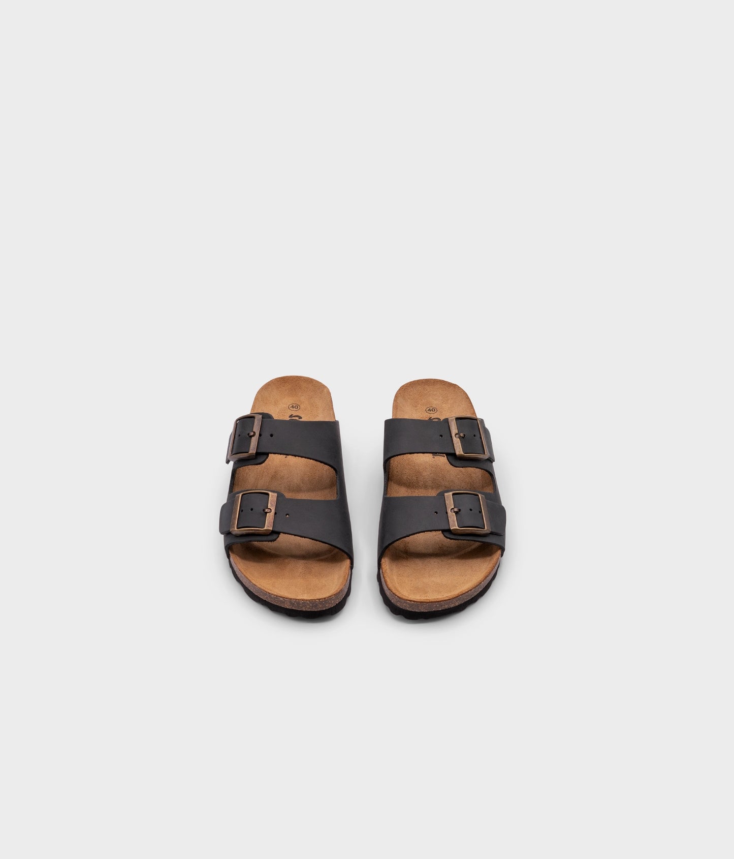 classic cork sandal with two straps in full-grain black nubuck leather with a blue tint, suede footbed and brass gold buckles