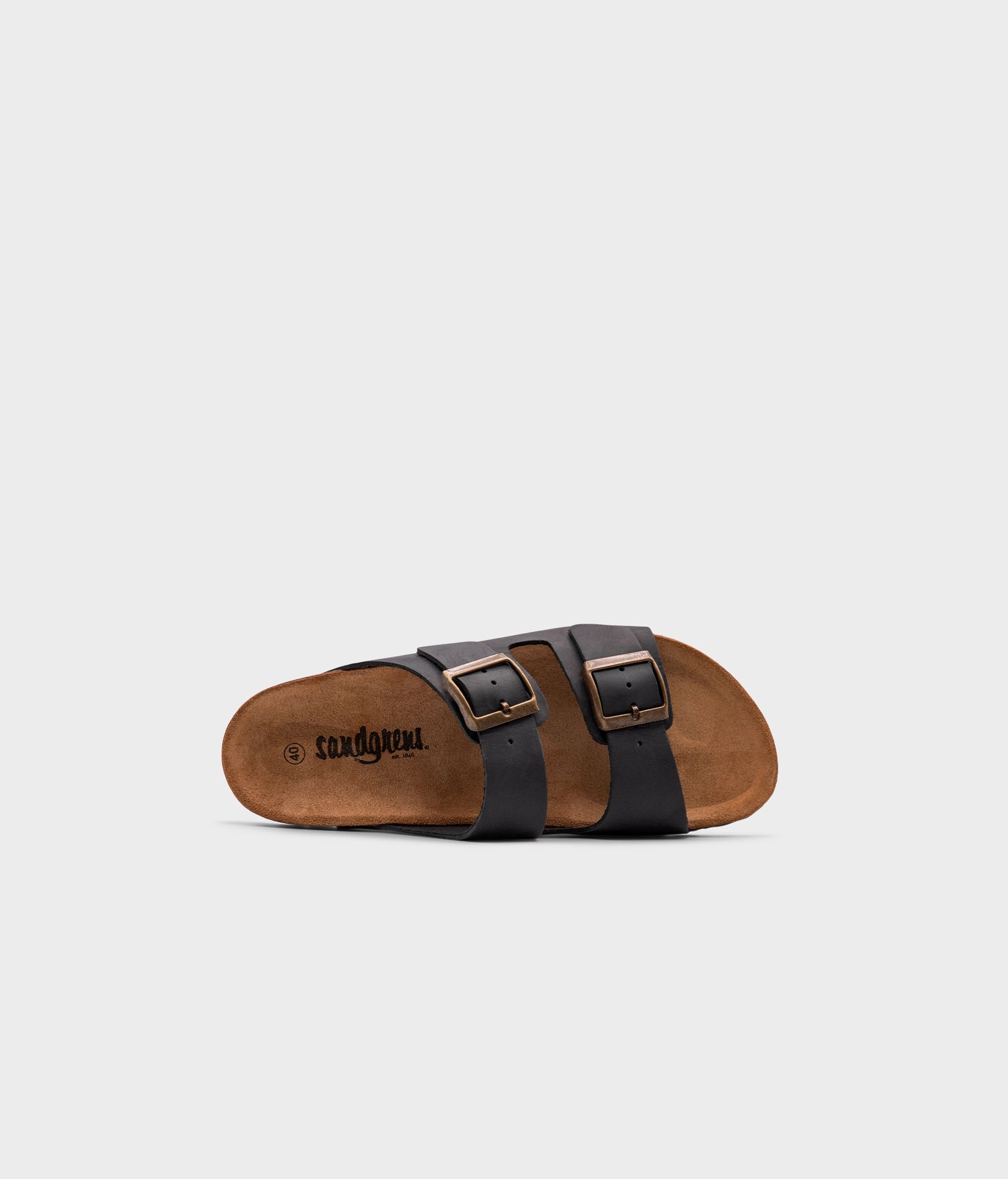 classic cork sandal with two straps in full-grain black nubuck leather with a blue tint, suede footbed and brass gold buckles