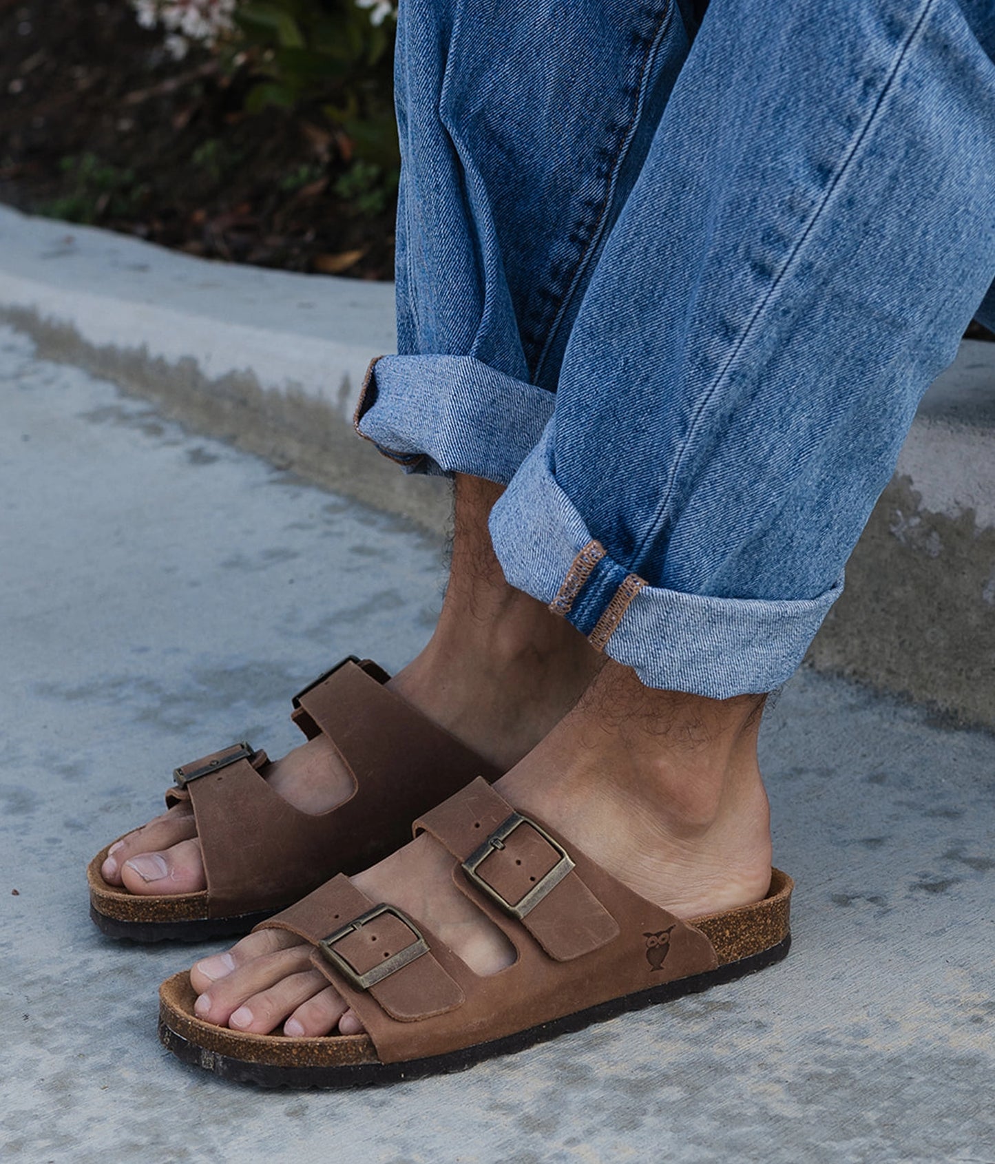 classic cork sandal with two straps in full-grain light brown nubuck leather, suede footbed and brass gold buckles