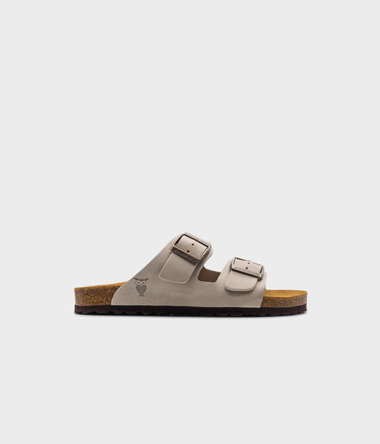 classic cork sandal with two straps in full-grain sand beige nubuck leather, suede footbed and brass gold buckles