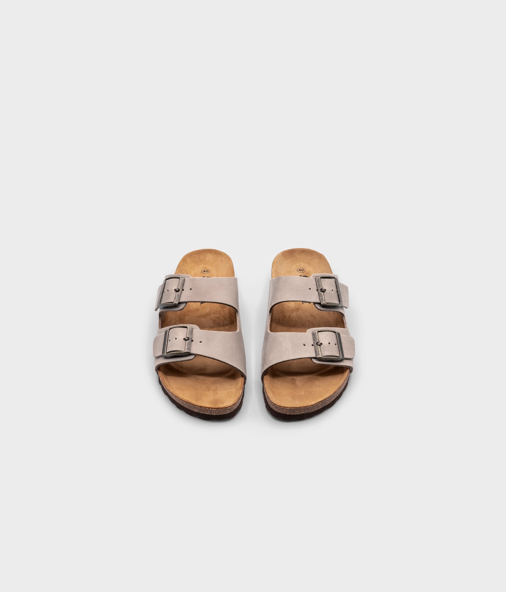 classic cork sandal with two straps in full-grain sand beige nubuck leather, suede footbed and brass gold buckles