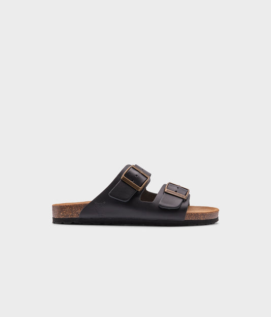 classic cork sandal with two straps in top-grain black vegetable tanden leather, suede footbed and brass gold buckles