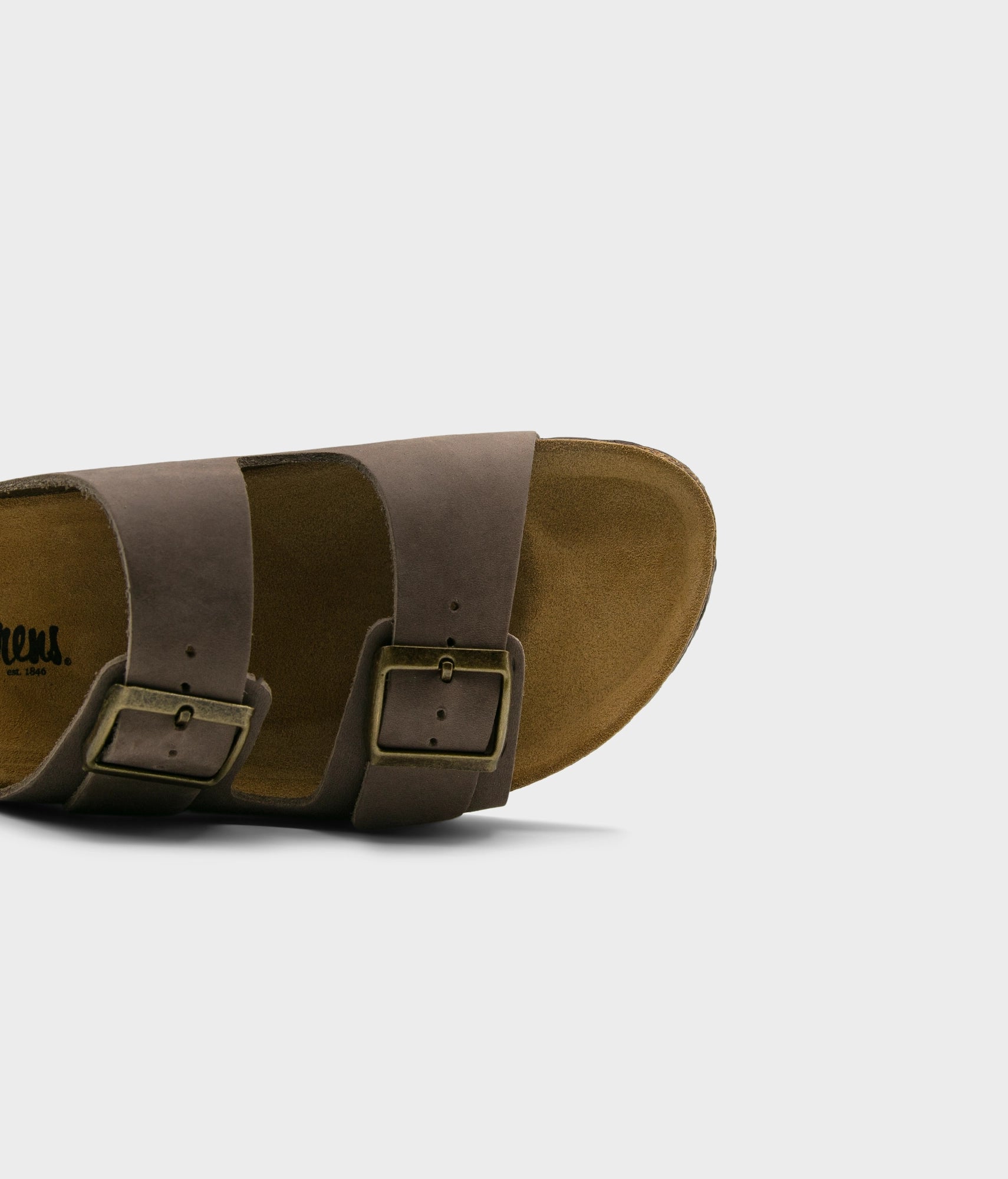 classic cork sandal with two straps in full-grain walnut brown nubuck leather with a blue tint, suede footbed and brass gold buckles