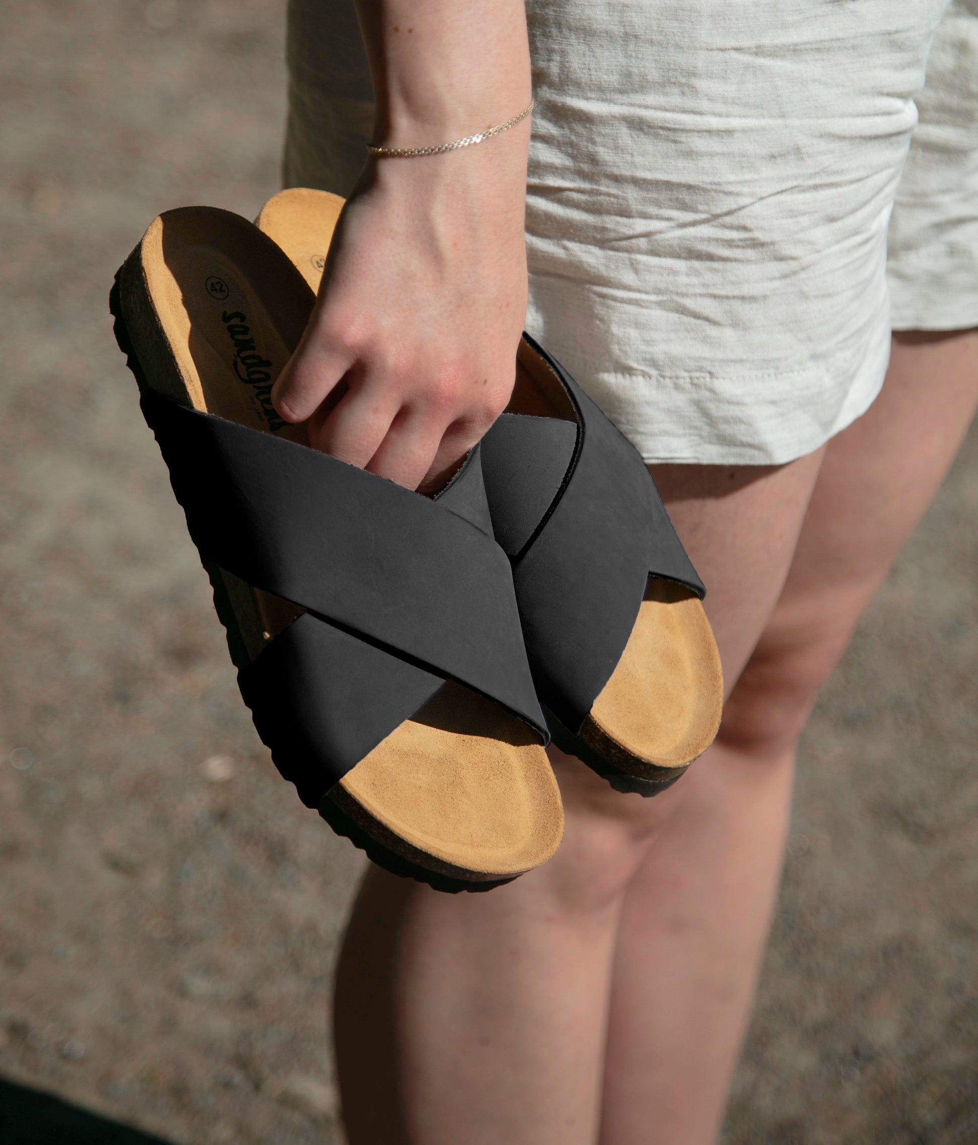 criss cross cork sandal in black oiled full-grain nubuck leather with a black EVA outersole and suede footbed