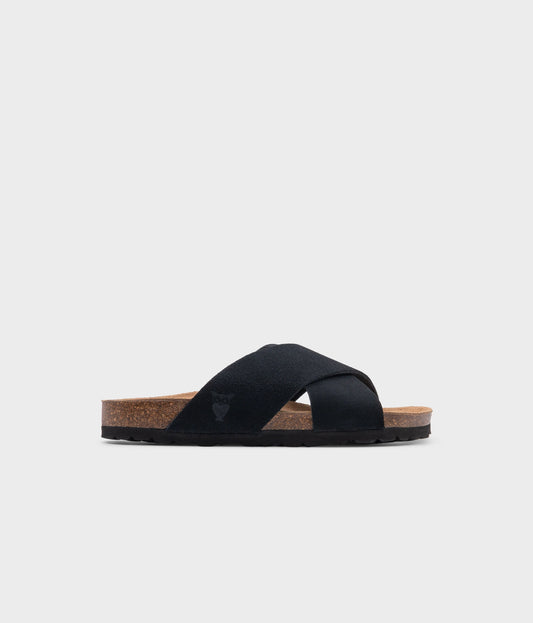 criss cross cork sandal in black soft suede eather with a black EVA outersole and suede footbed
