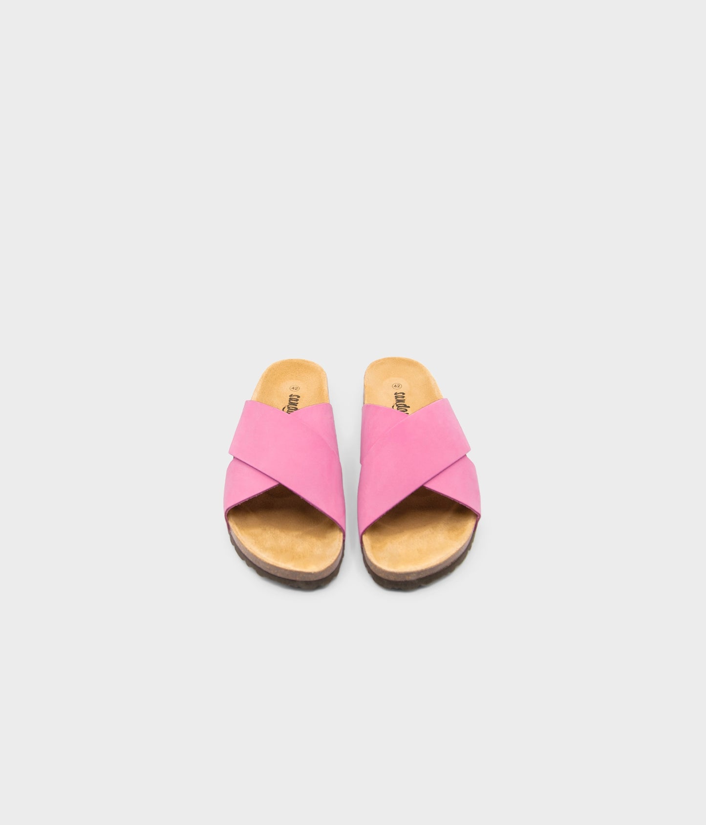 criss cross cork sandal in magenta pink oiled full-grain nubuck leather with a brown EVA outersole and suede footbed