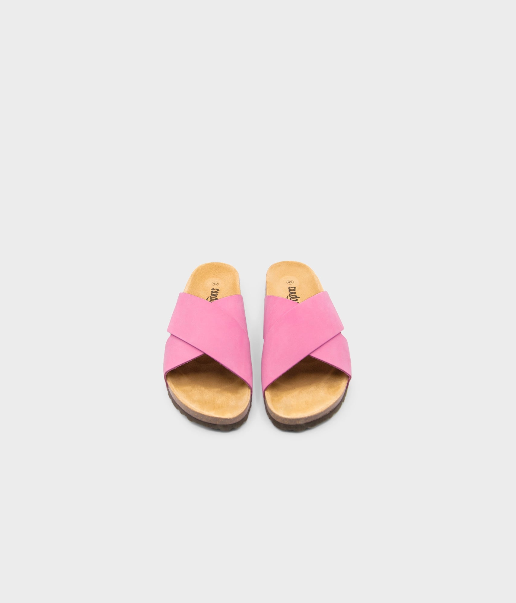 criss cross cork sandal in magenta pink oiled full-grain nubuck leather with a brown EVA outersole and suede footbed