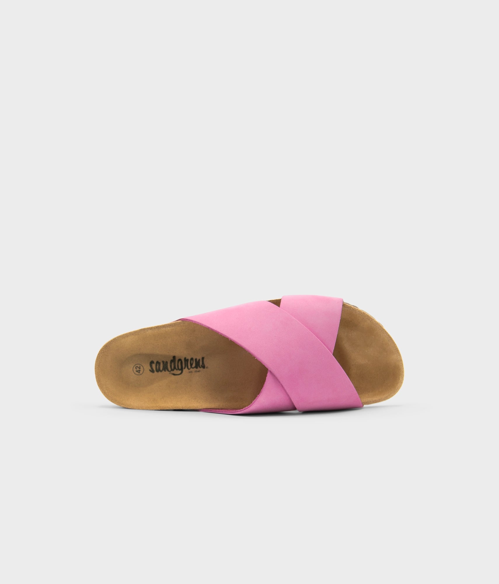 criss cross cork sandal in magenta pink oiled full-grain nubuck leather with a brown EVA outersole and suede footbed