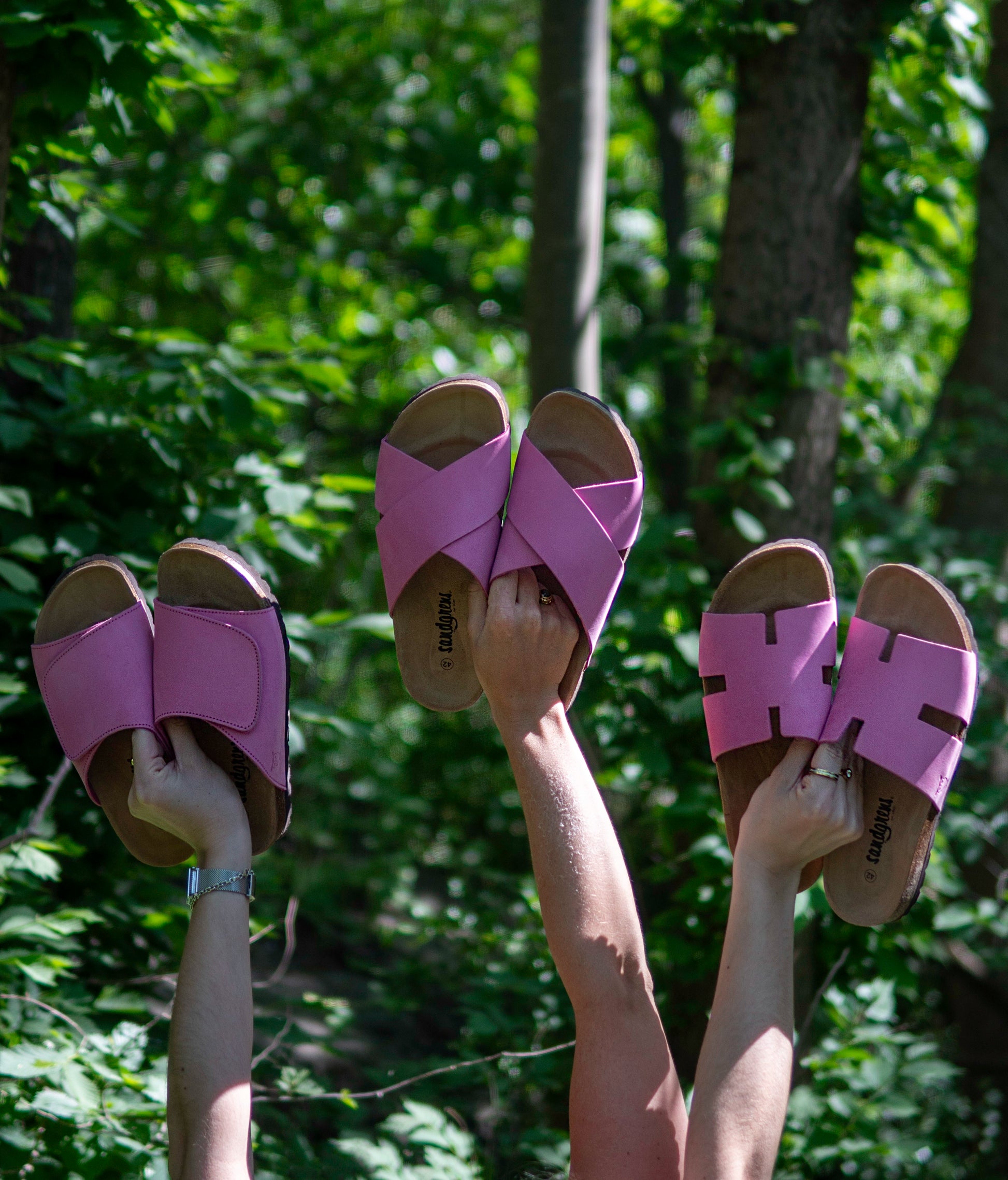 criss cross cork sandal in magenta pink oiled full-grain nubuck leather with a brown EVA outersole and suede footbed