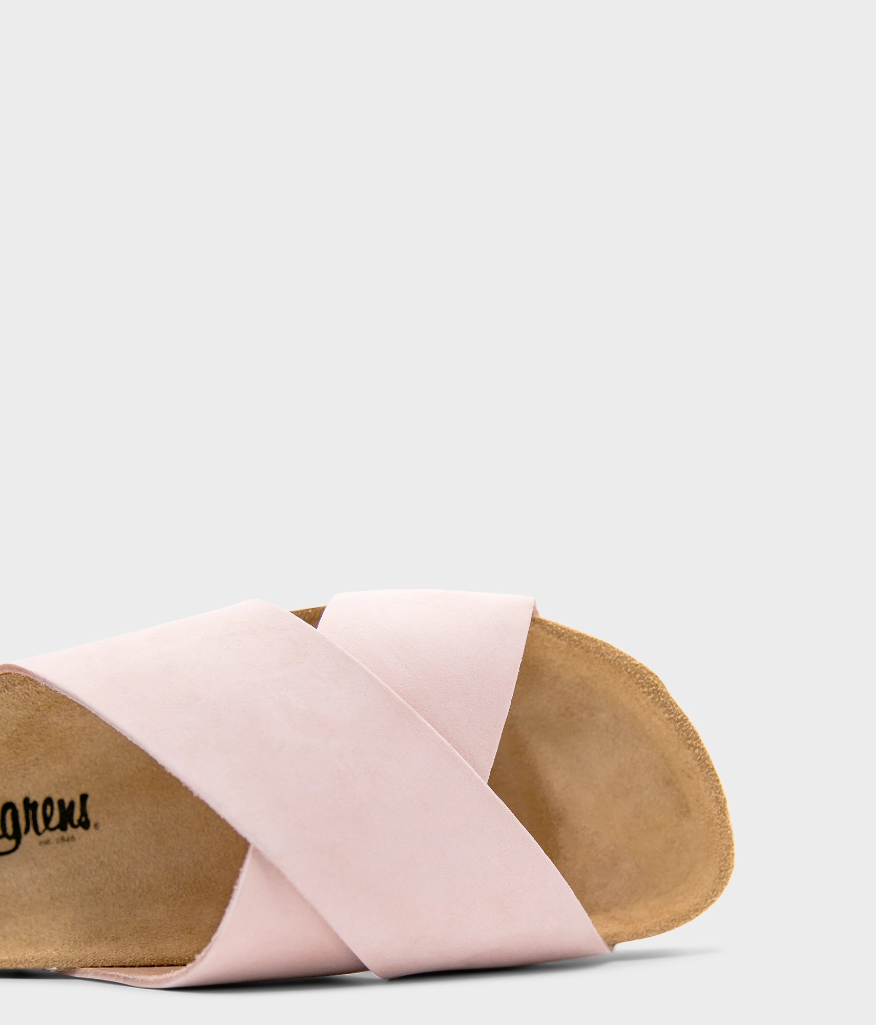 criss cross cork sandal in pale pink oiled full-grain nubuck leather with a brown EVA outersole and suede footbed