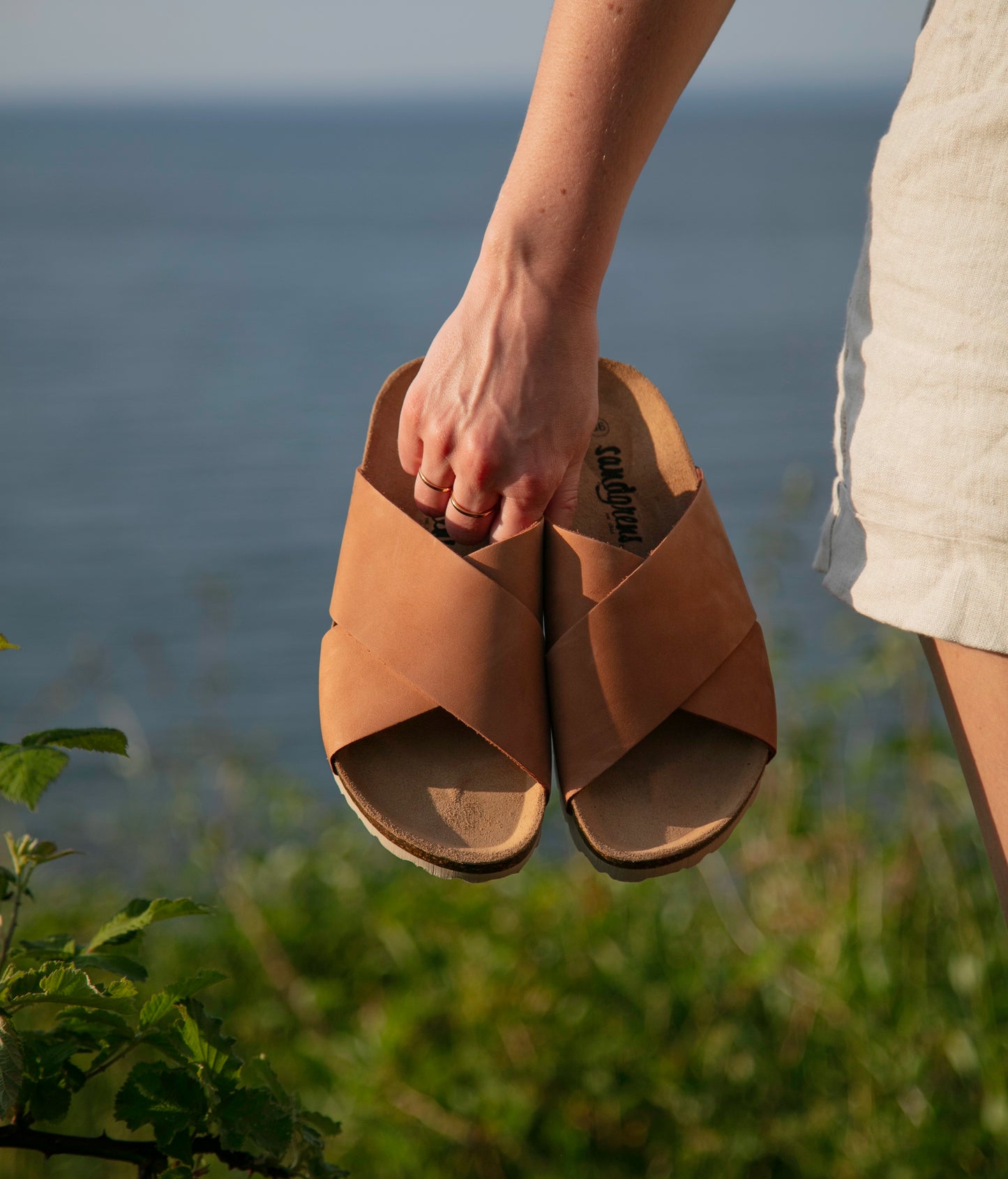 criss cross cork sandal in light terracotta oiled full-grain nubuck leather with a brown EVA outersole and suede footbed