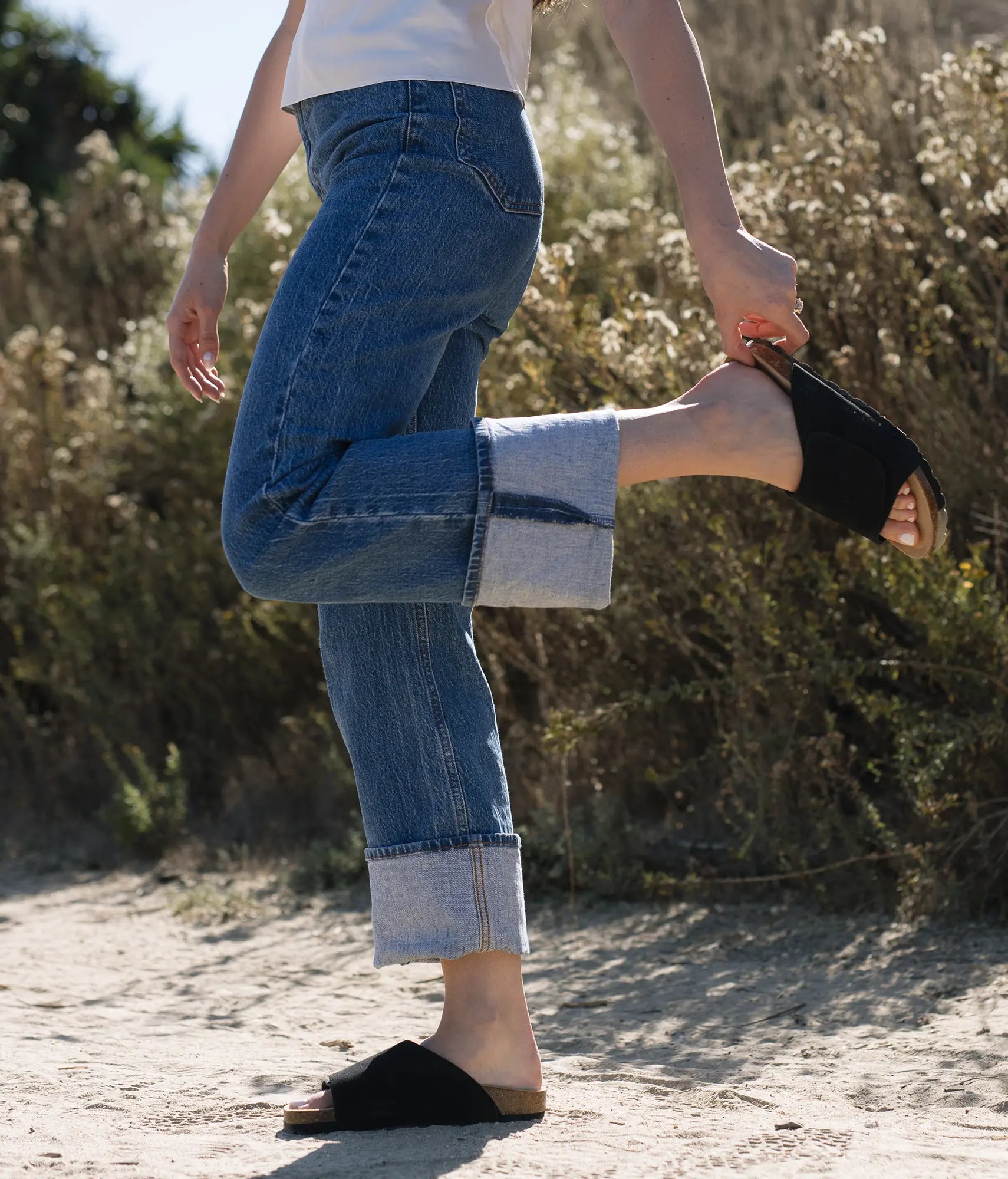 Women wearing Vigo velcro cork sandals in Sandstone black ember, suede footbed and black EVA outersole
