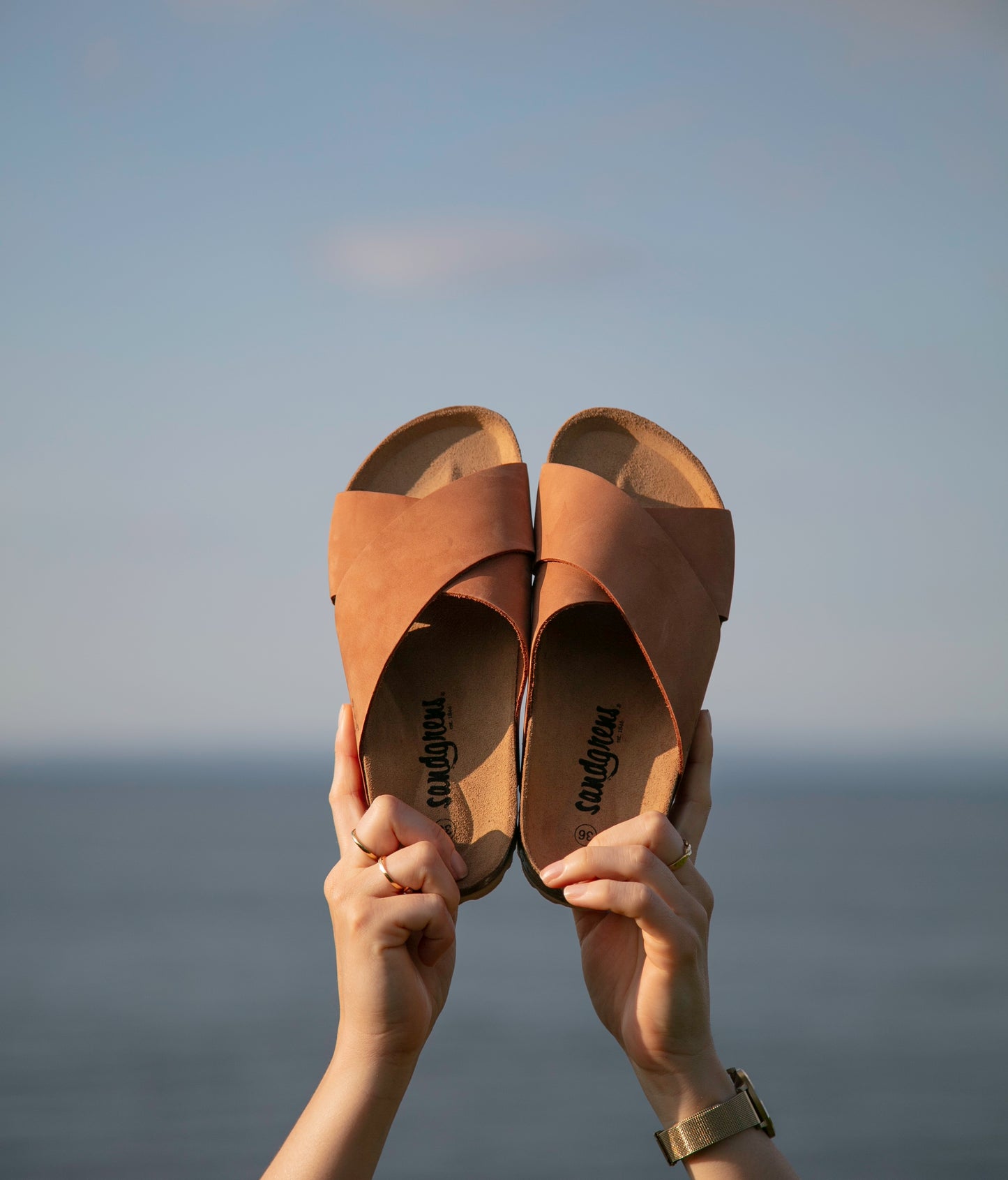 criss cross cork sandal in light terracotta oiled full-grain nubuck leather with a brown EVA outersole and suede footbed